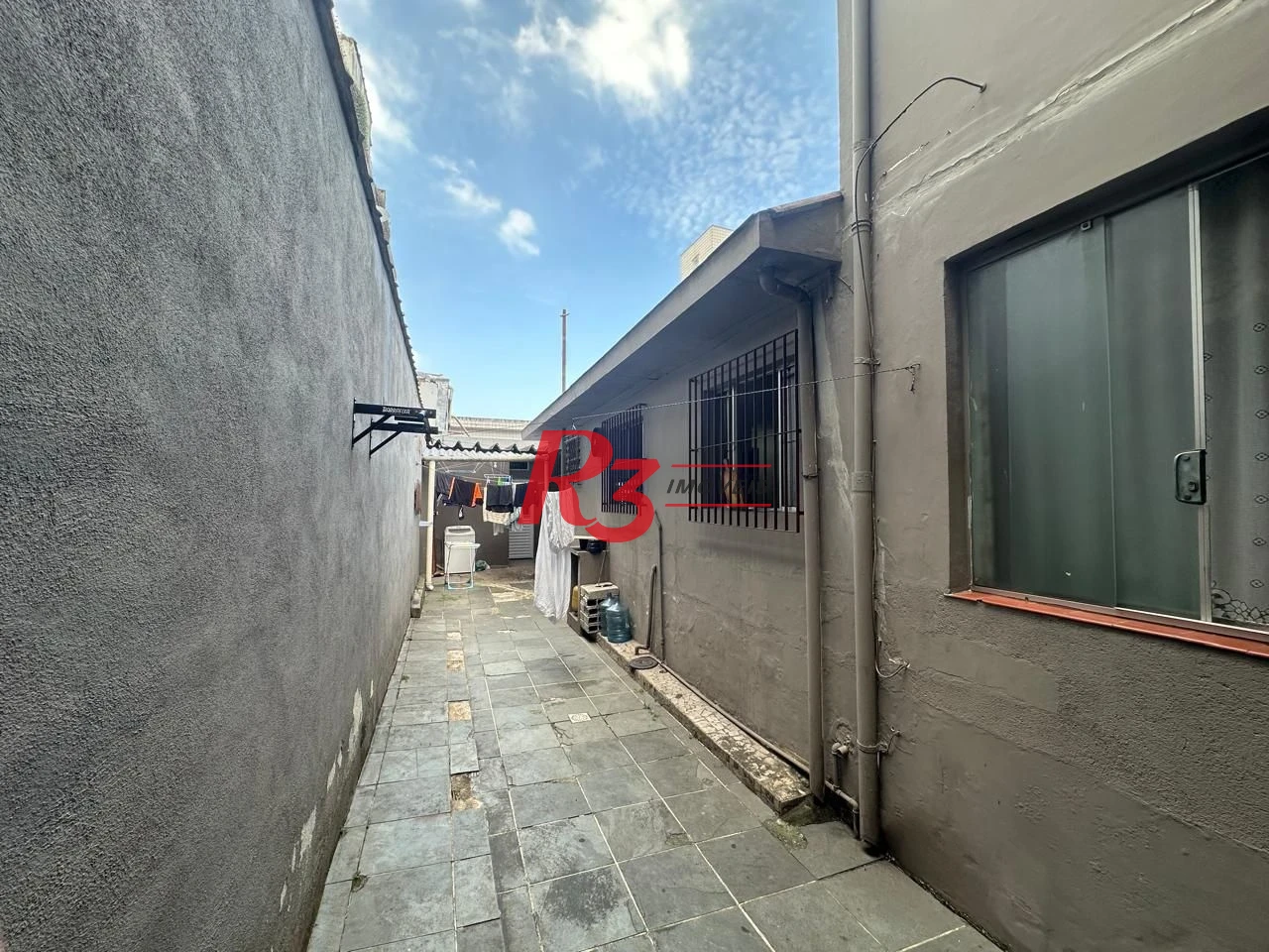 Casa com 6 dormitórios à venda, 223 m² por R$ 900.000,00 - Vila Matias - Santos/SP