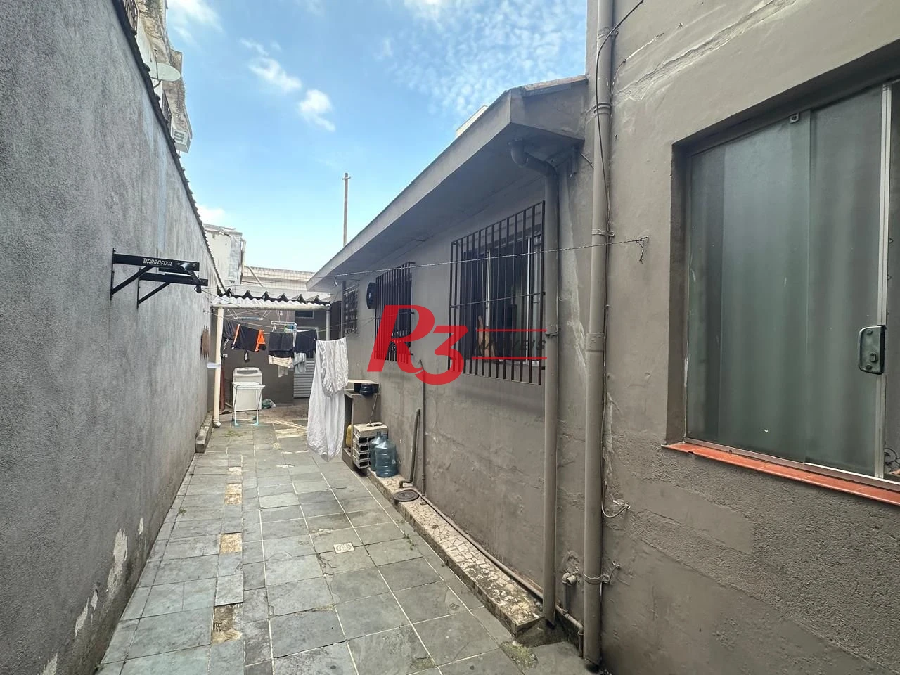 Casa com 6 dormitórios à venda, 223 m² por R$ 900.000,00 - Vila Matias - Santos/SP