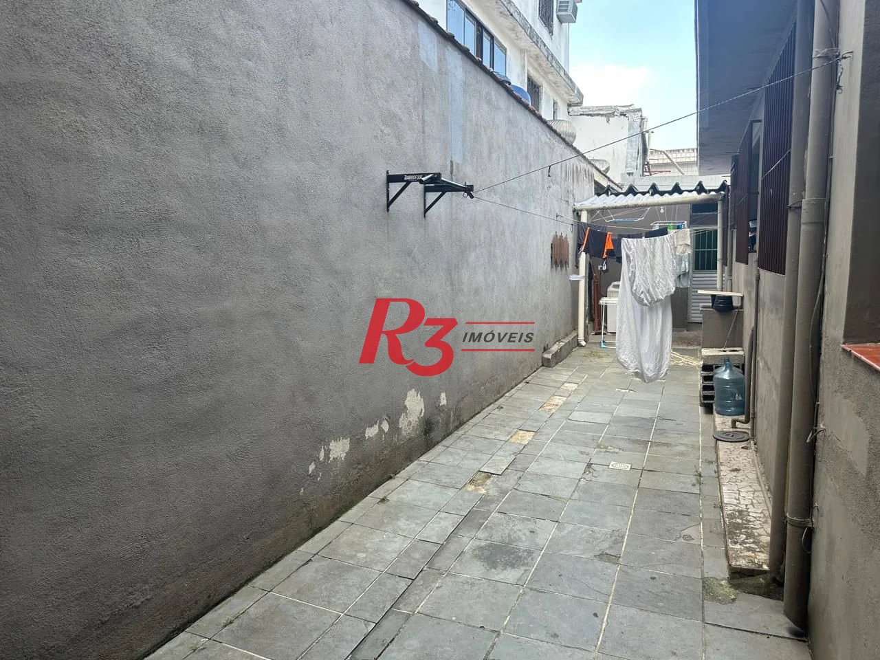 Casa com 6 dormitórios à venda, 223 m² por R$ 900.000,00 - Vila Matias - Santos/SP