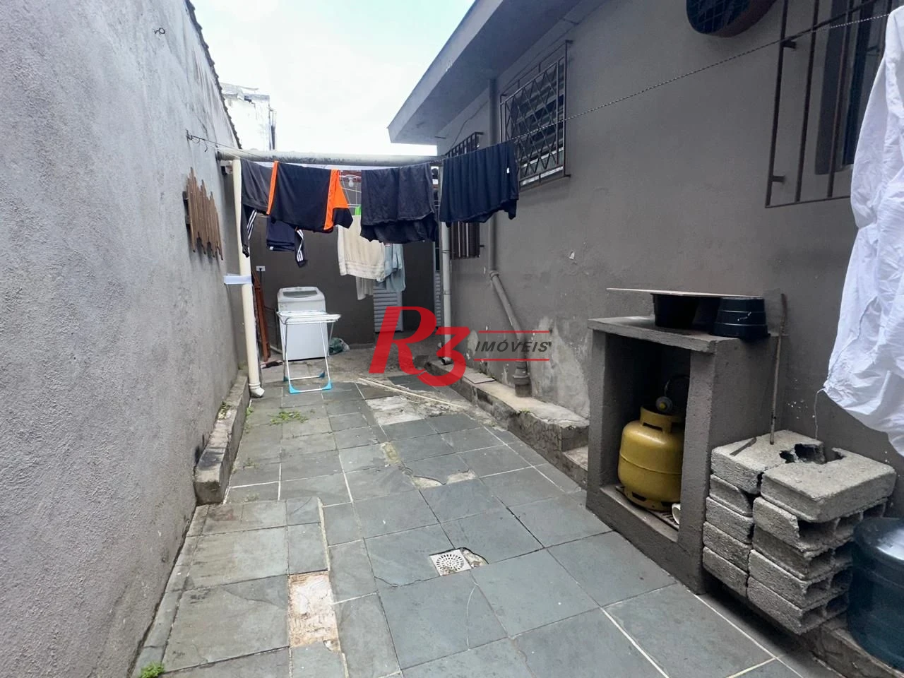 Casa com 6 dormitórios à venda, 223 m² por R$ 900.000,00 - Vila Matias - Santos/SP
