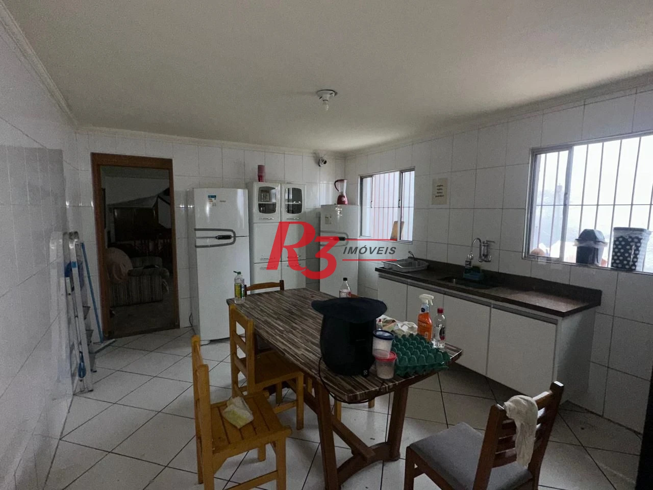 Casa com 6 dormitórios à venda, 223 m² por R$ 900.000,00 - Vila Matias - Santos/SP