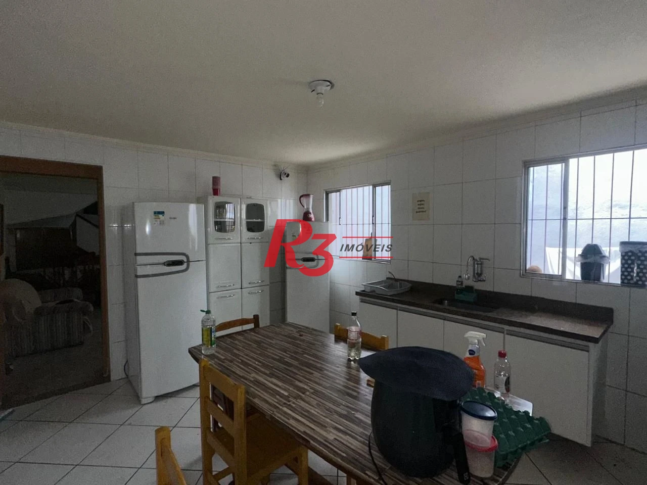 Casa com 6 dormitórios à venda, 223 m² por R$ 900.000,00 - Vila Matias - Santos/SP