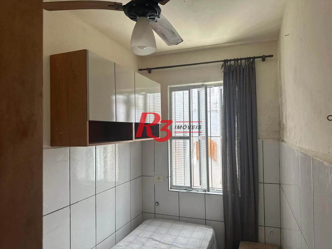 Casa com 6 dormitórios à venda, 223 m² por R$ 900.000,00 - Vila Matias - Santos/SP
