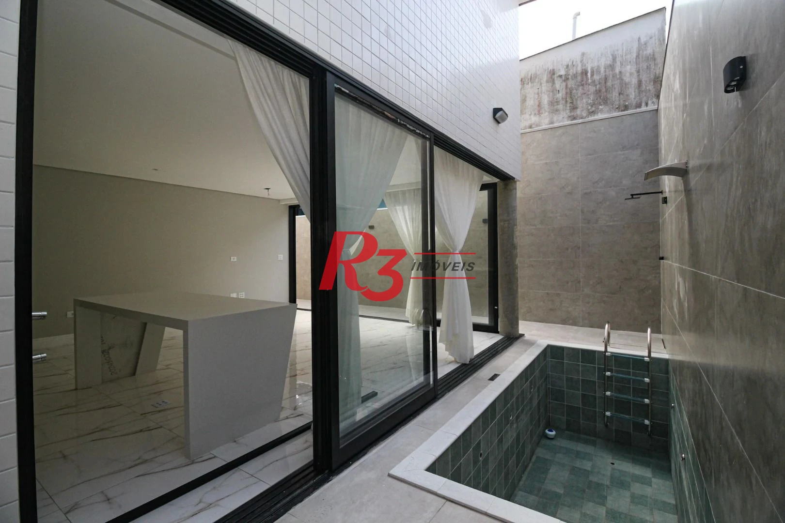 Casa à venda, 150 m² por R$ 990.000,00 - Marapé - Santos/SP