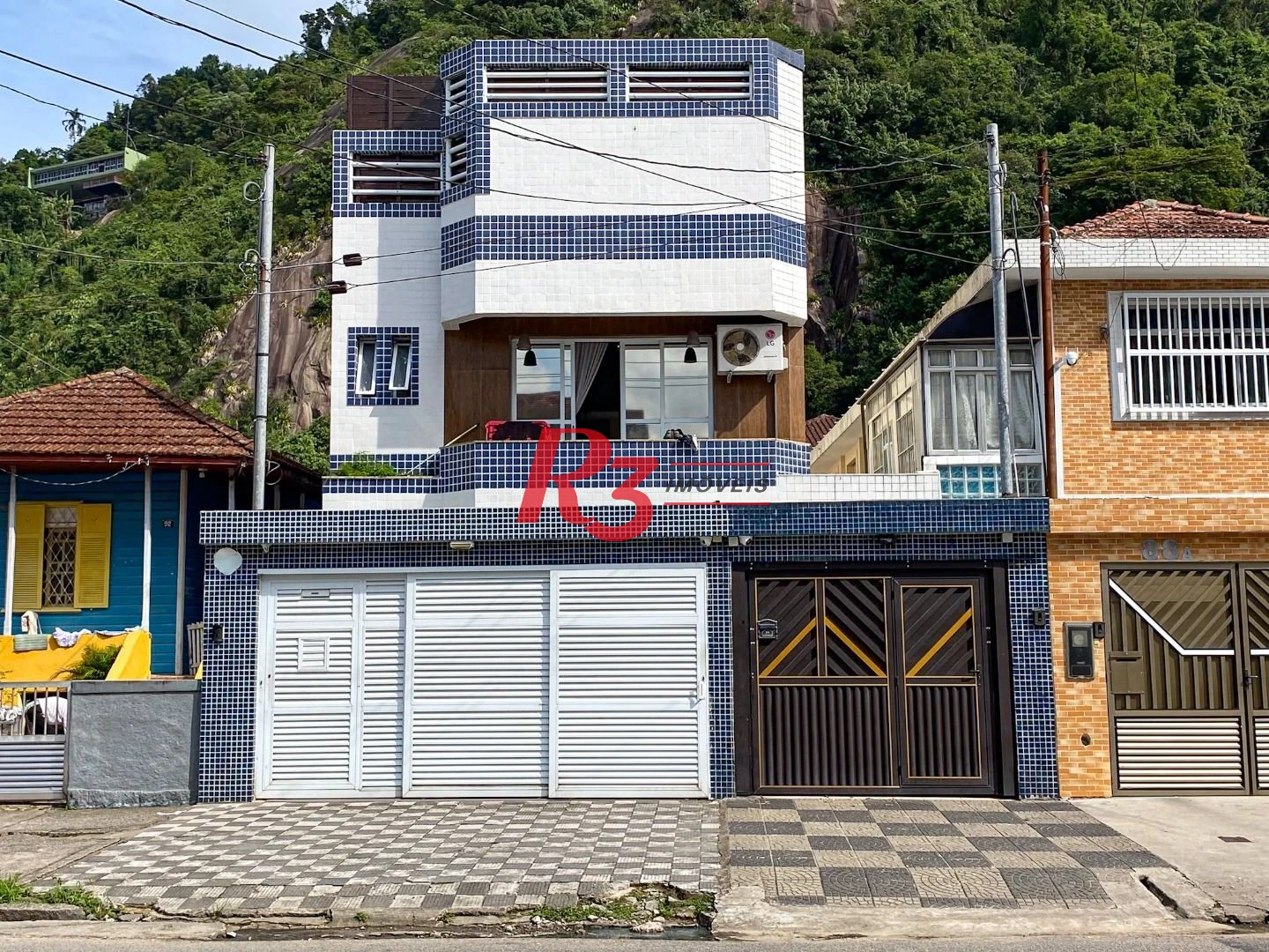Casa com 5 dormitórios à venda, 367 m² por R$ 1.600.000,00 - Marapé - Santos/SP