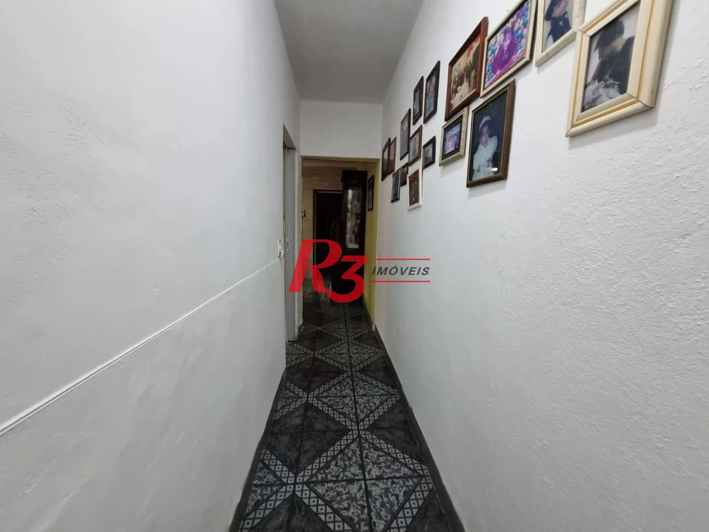 Sobrado com 3 dormitórios à venda, 120 m² por R$ 400.000,00 - Parque Bitaru - São Vicente/SP