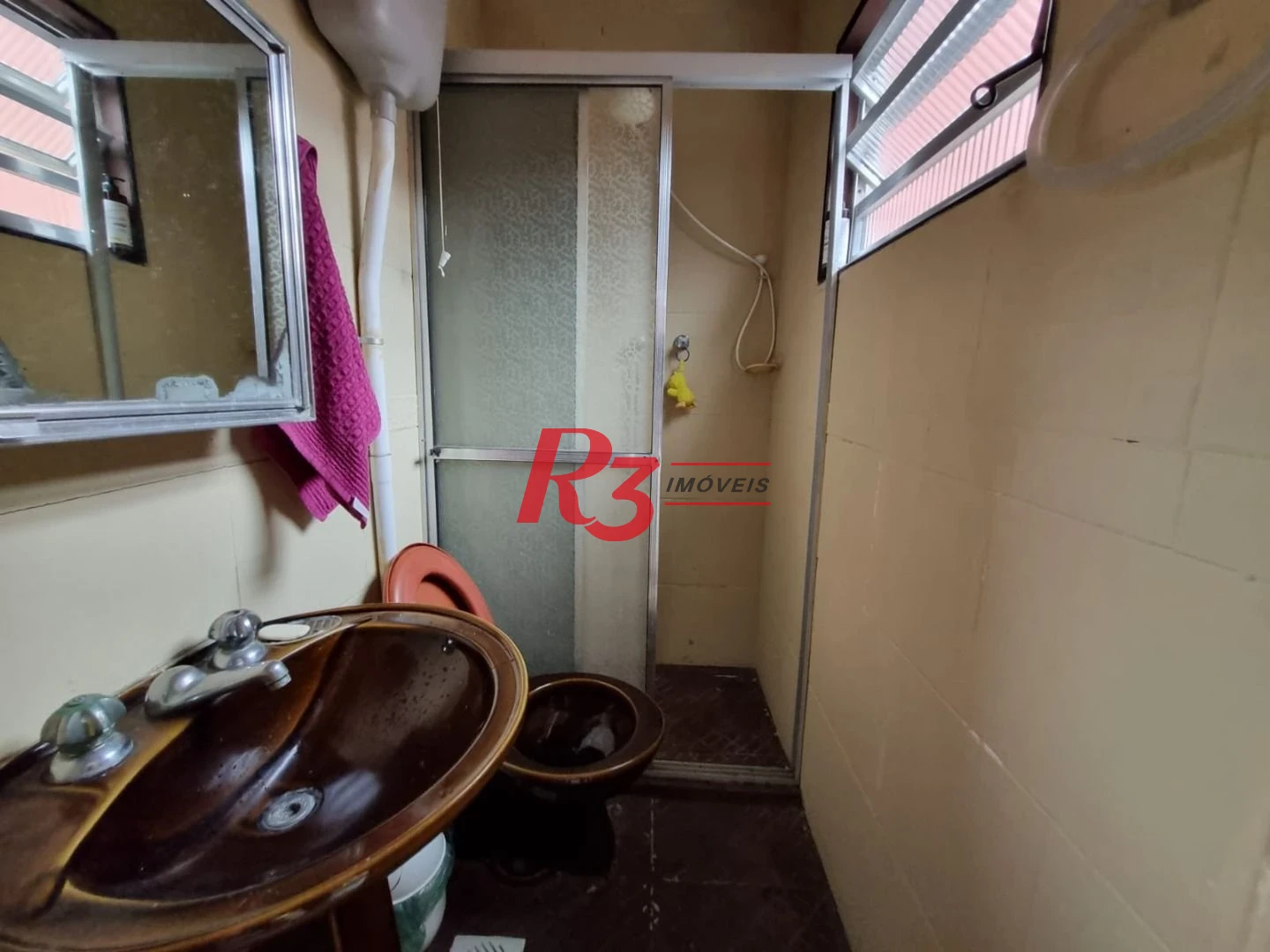 Sobrado com 3 dormitórios à venda, 120 m² por R$ 400.000,00 - Parque Bitaru - São Vicente/SP