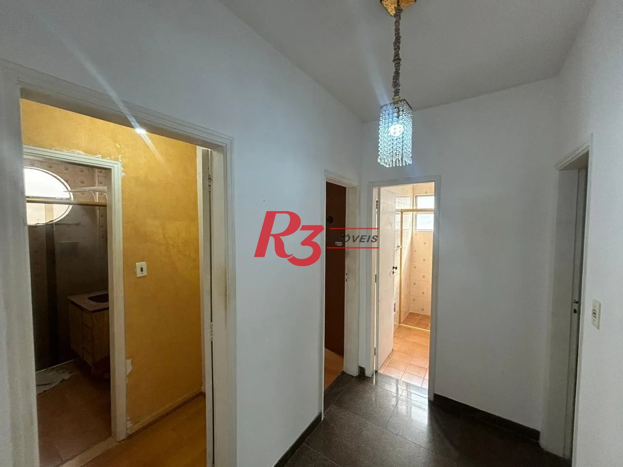 Apartamento com 3 dormitórios à venda, 123 m² por R$ 750.000,00 - Gonzaga - Santos/SP