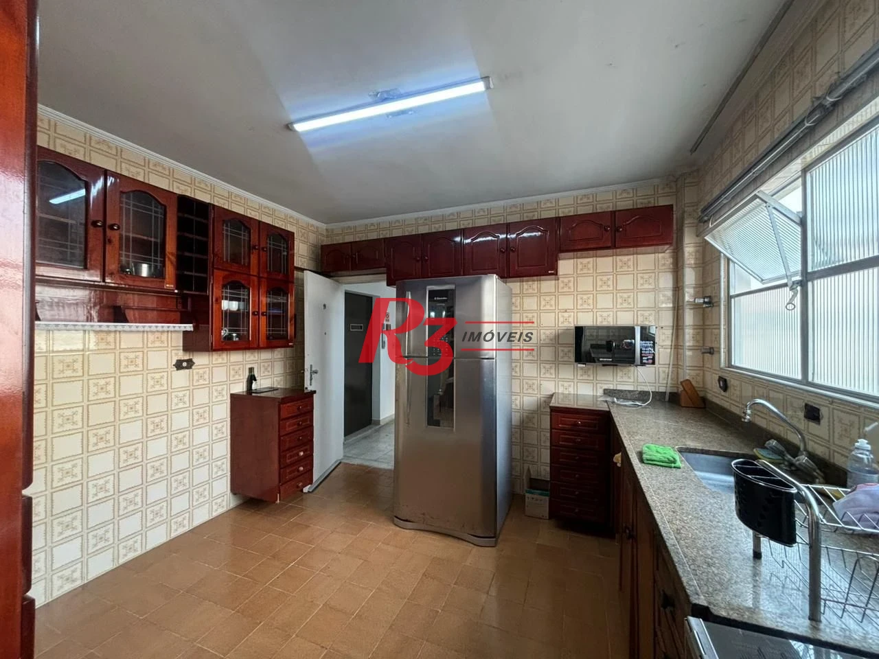 Apartamento com 3 dormitórios à venda, 123 m² por R$ 750.000,00 - Gonzaga - Santos/SP