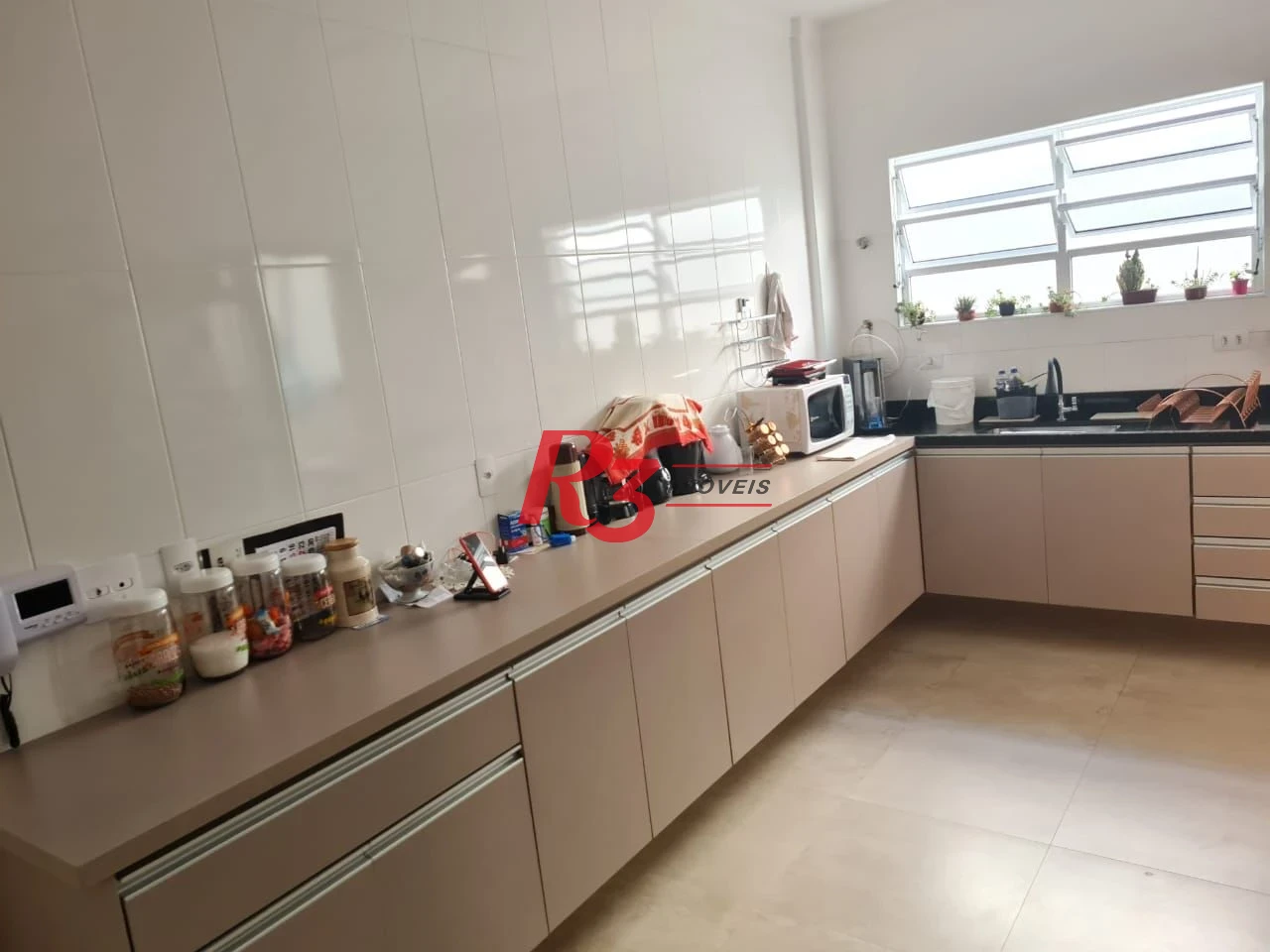 Casa com 3 dormitórios à venda, 146 m² por R$ 1.080.000,00 - Embaré - Santos/SP