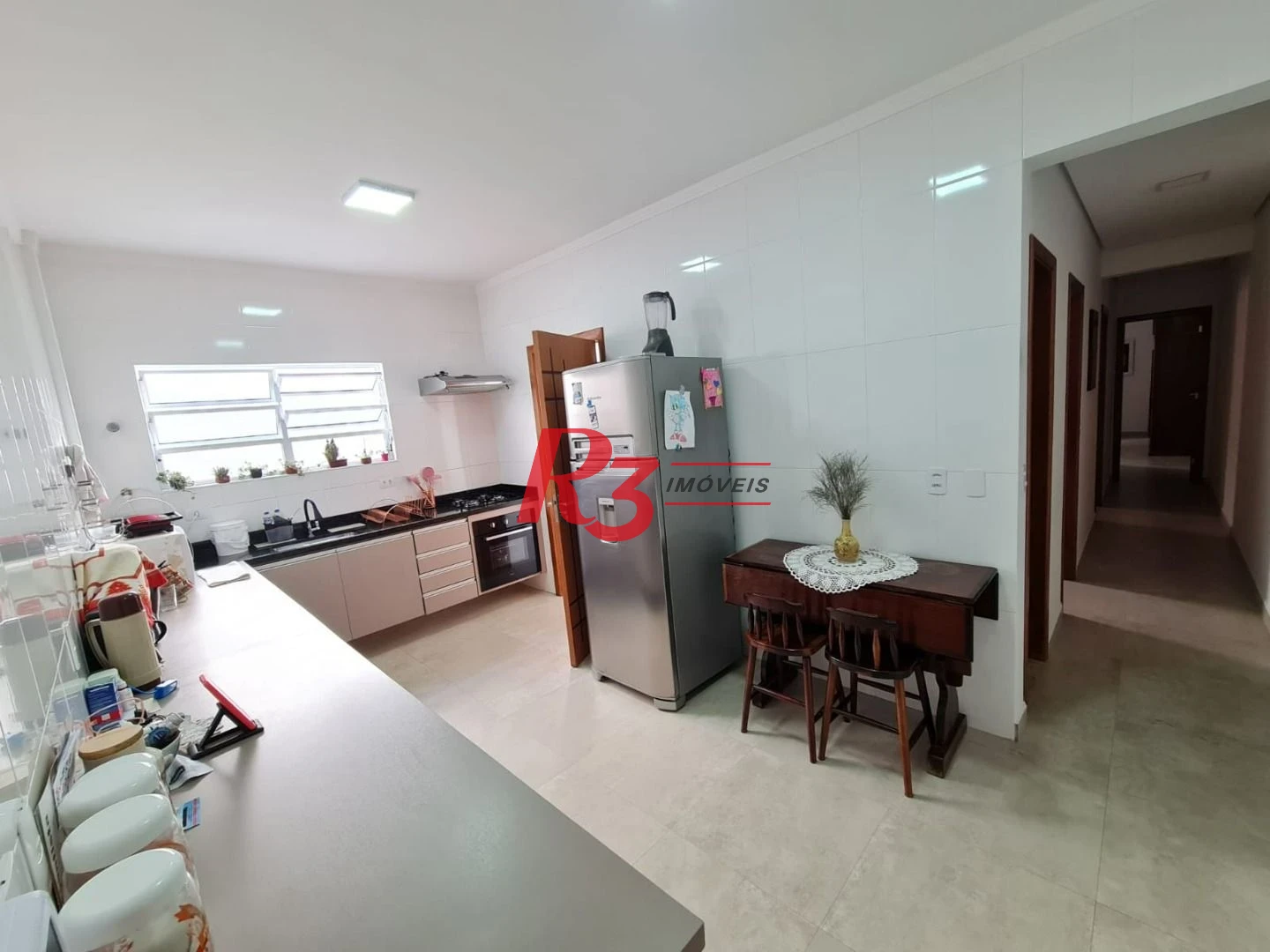 Casa com 3 dormitórios à venda, 146 m² por R$ 1.080.000,00 - Embaré - Santos/SP