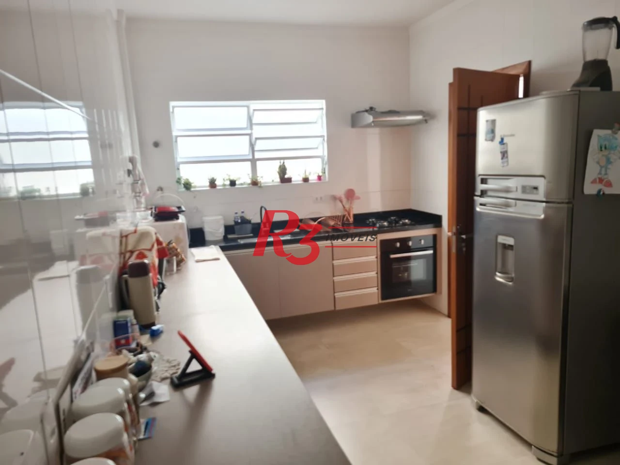 Casa com 3 dormitórios à venda, 146 m² por R$ 1.080.000,00 - Embaré - Santos/SP