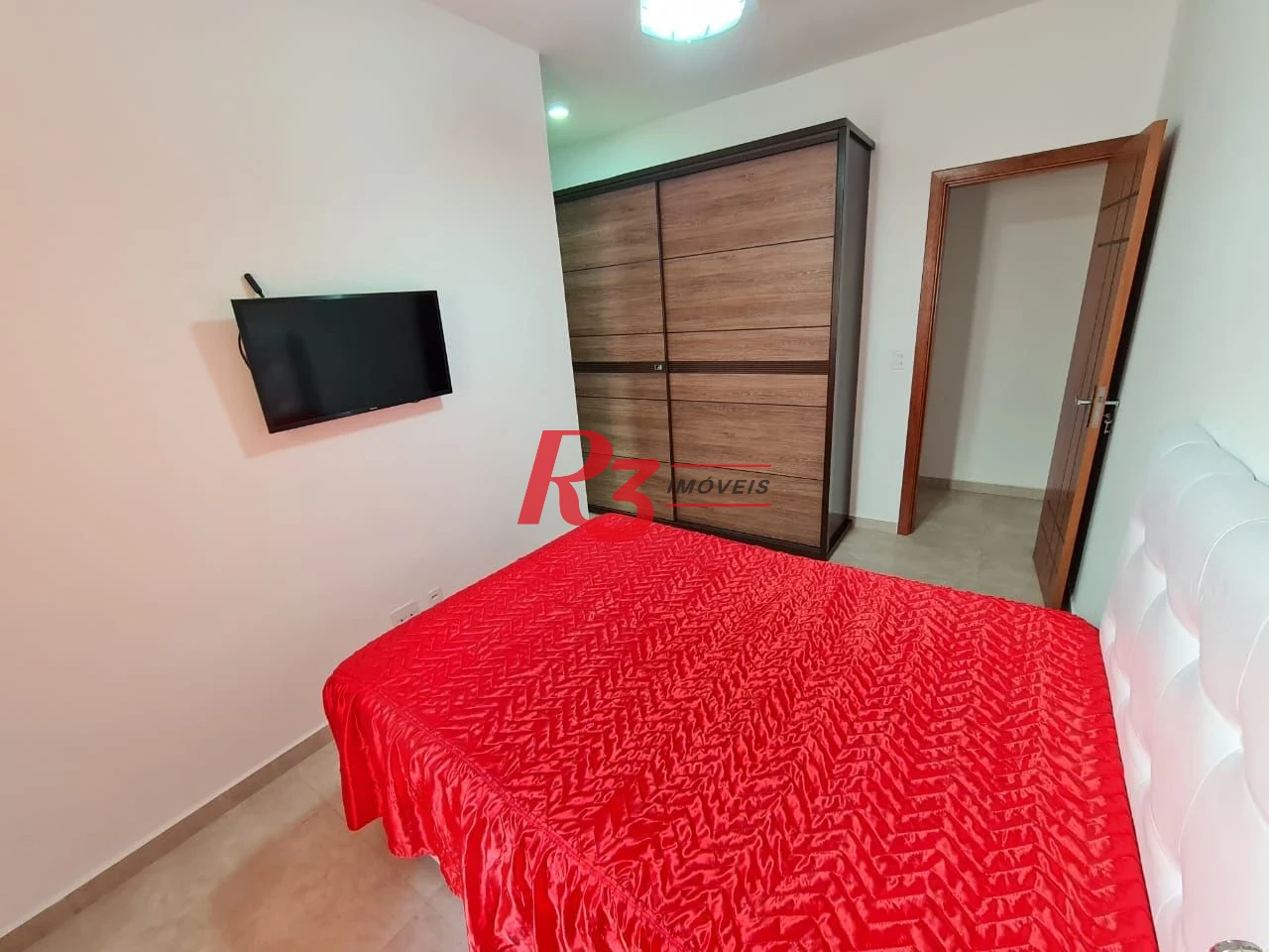 Casa com 3 dormitórios à venda, 146 m² por R$ 1.080.000,00 - Embaré - Santos/SP