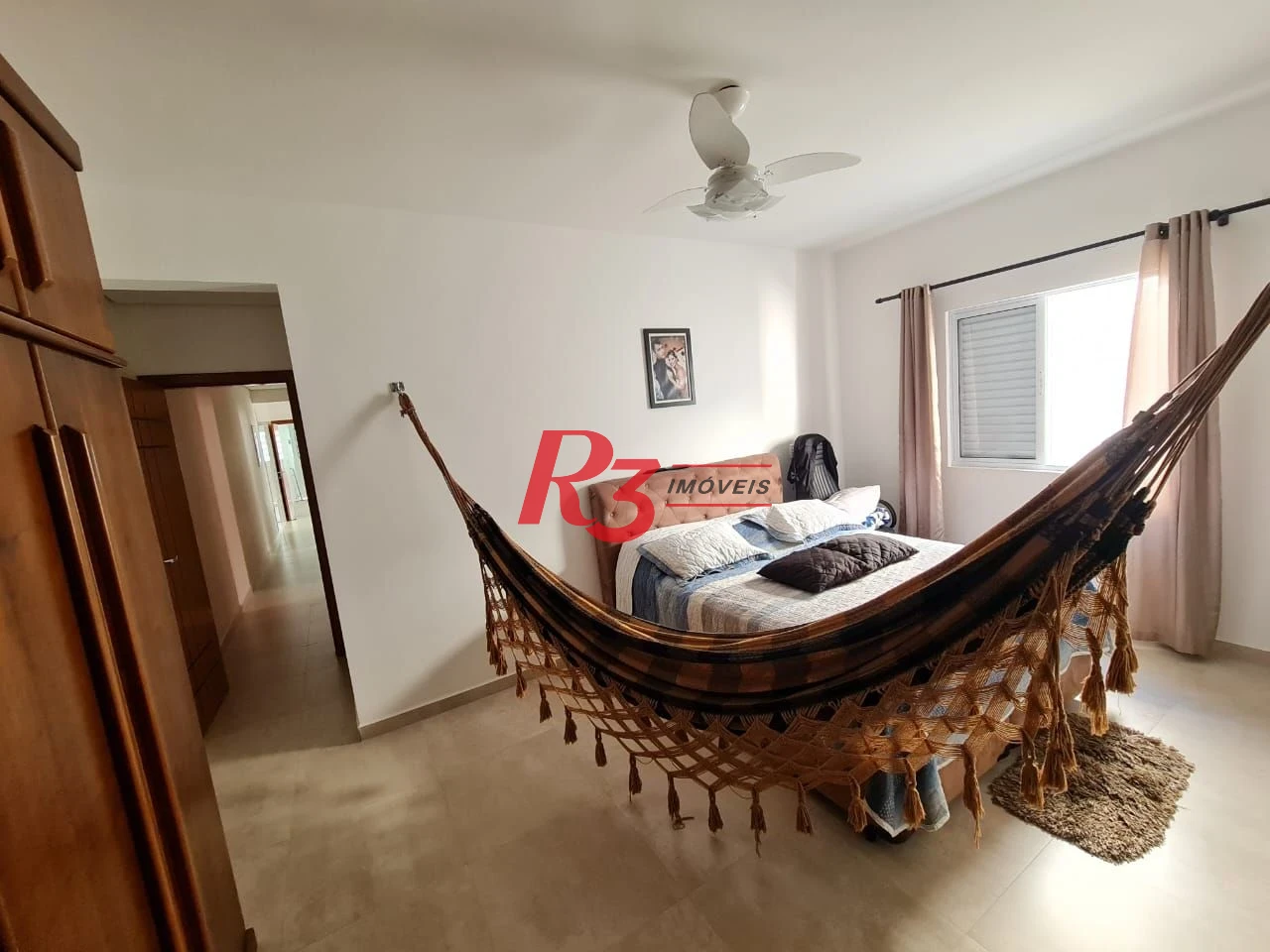 Casa com 3 dormitórios à venda, 146 m² por R$ 1.080.000,00 - Embaré - Santos/SP