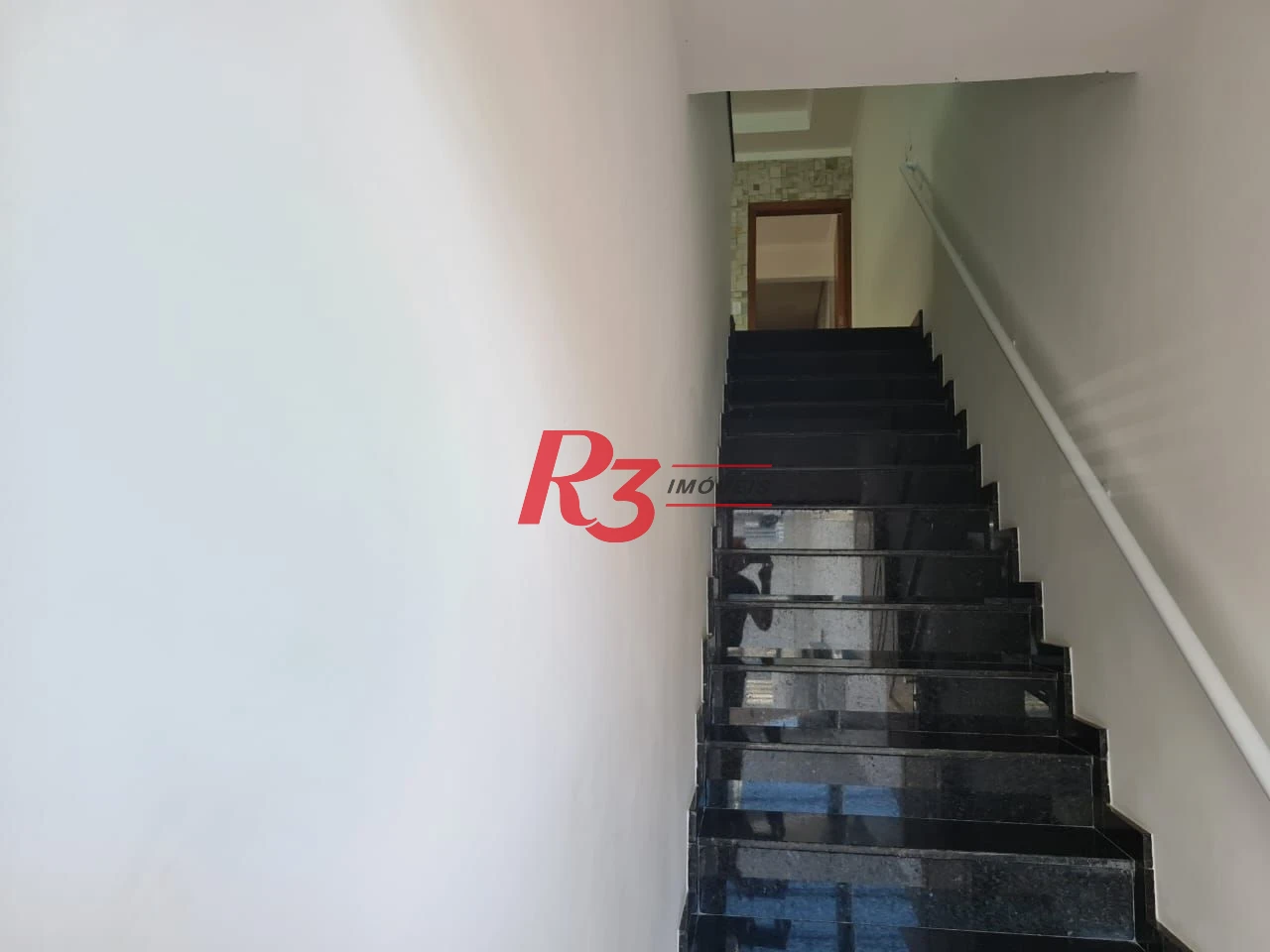 Casa com 3 dormitórios à venda, 146 m² por R$ 1.080.000,00 - Embaré - Santos/SP