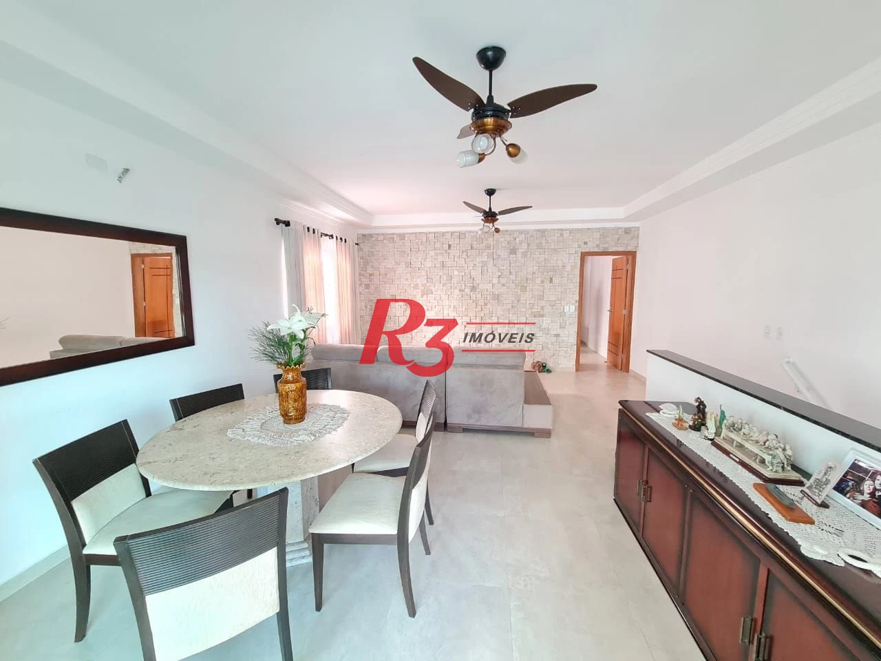 Casa com 3 dormitórios à venda, 146 m² por R$ 1.080.000,00 - Embaré - Santos/SP