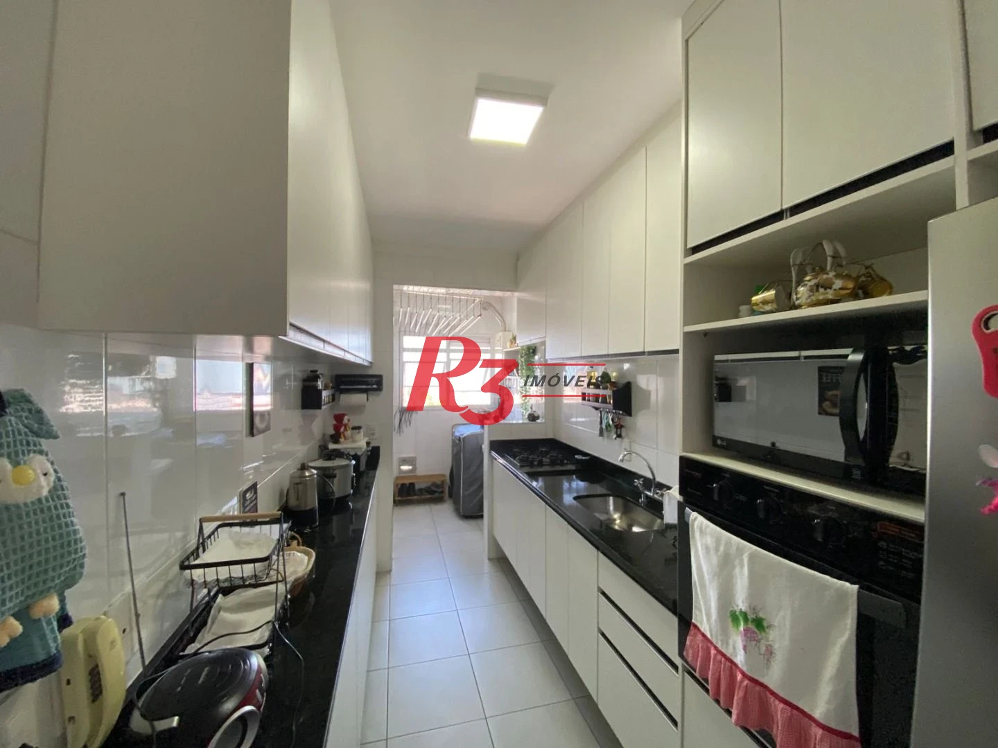 Apartamento com 2 dormitórios à venda, 72 m² por R$ 855.000,00 - Embaré - Santos/SP