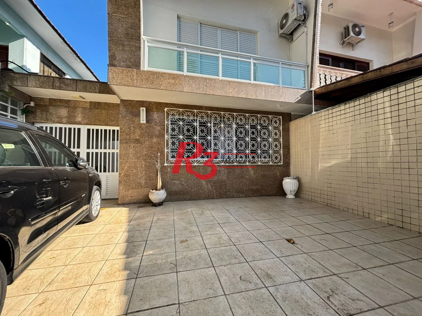 Sobrado à venda, 187 m² por R$ 2.100.000,00 - Ponta da Praia - Santos/SP