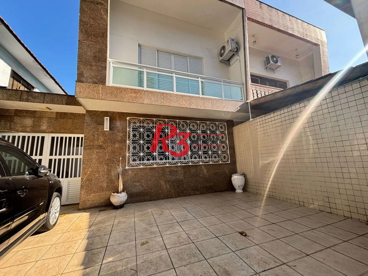 Sobrado à venda, 187 m² por R$ 2.100.000,00 - Ponta da Praia - Santos/SP