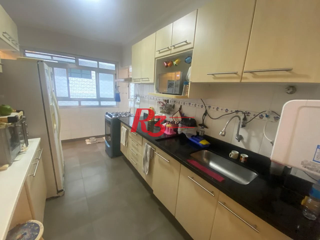 Apartamento com 2 dormitórios à venda, 98 m² por R$ 555.000,00 - Gonzaga - Santos/SP