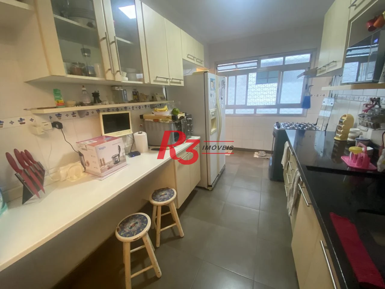 Apartamento com 2 dormitórios à venda, 98 m² por R$ 555.000,00 - Gonzaga - Santos/SP