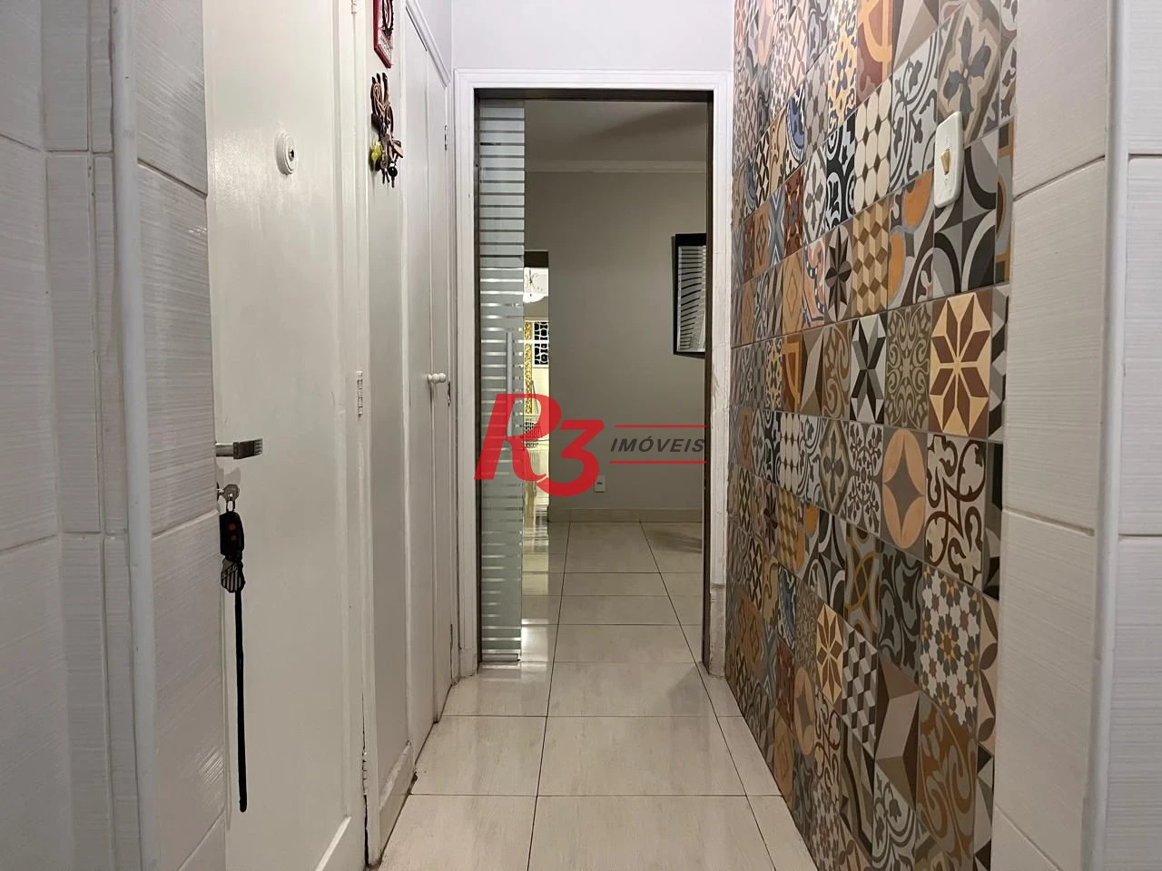 Apartamento com 3 dormitórios à venda, 117 m² por R$ 590.000,00 - Gonzaga - Santos/SP