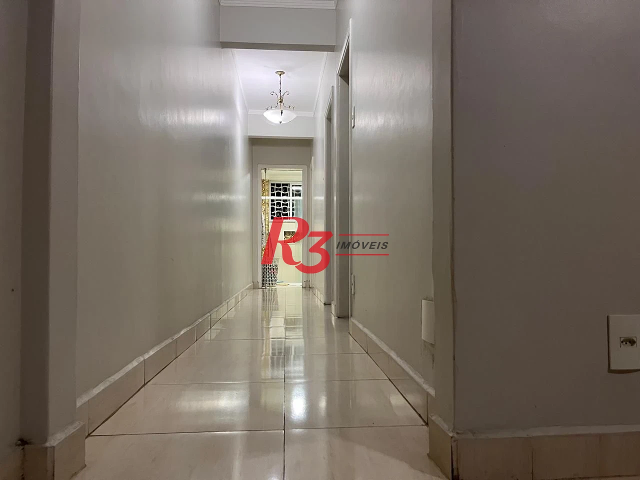 Apartamento com 3 dormitórios à venda, 117 m² por R$ 590.000,00 - Gonzaga - Santos/SP