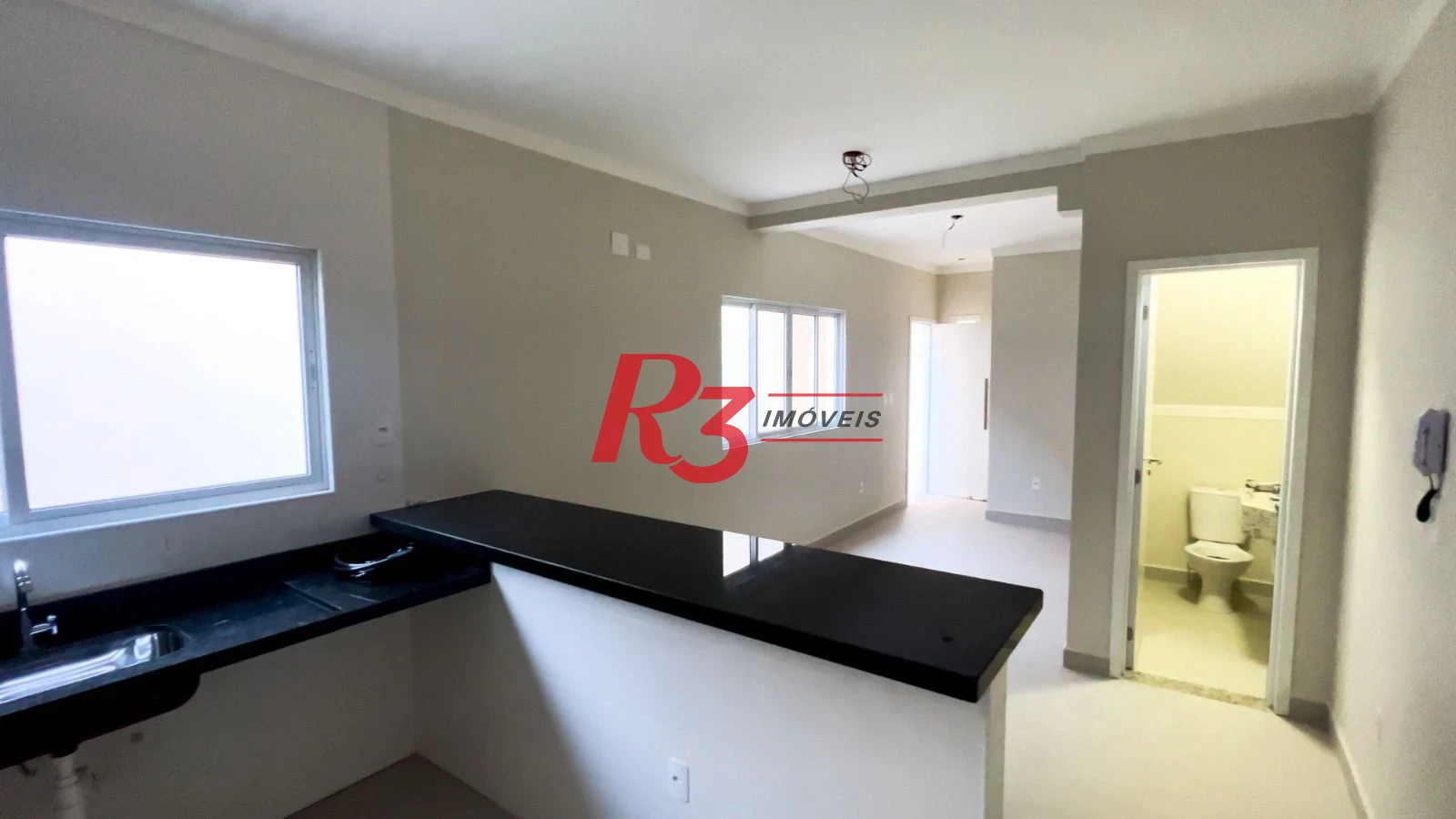 Casa com 3 suítes à venda, 115 m² por R$ 820.000 - Marapé - Santos/SP