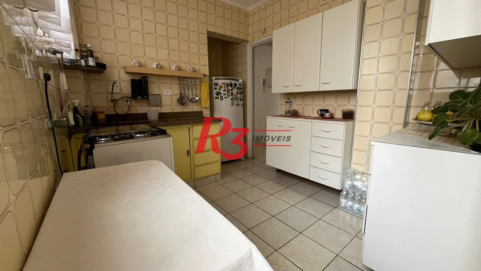 Apartamento com 2 dormitórios à venda, 75 m² por R$ 550.000,00 - Gonzaga - Santos/SP