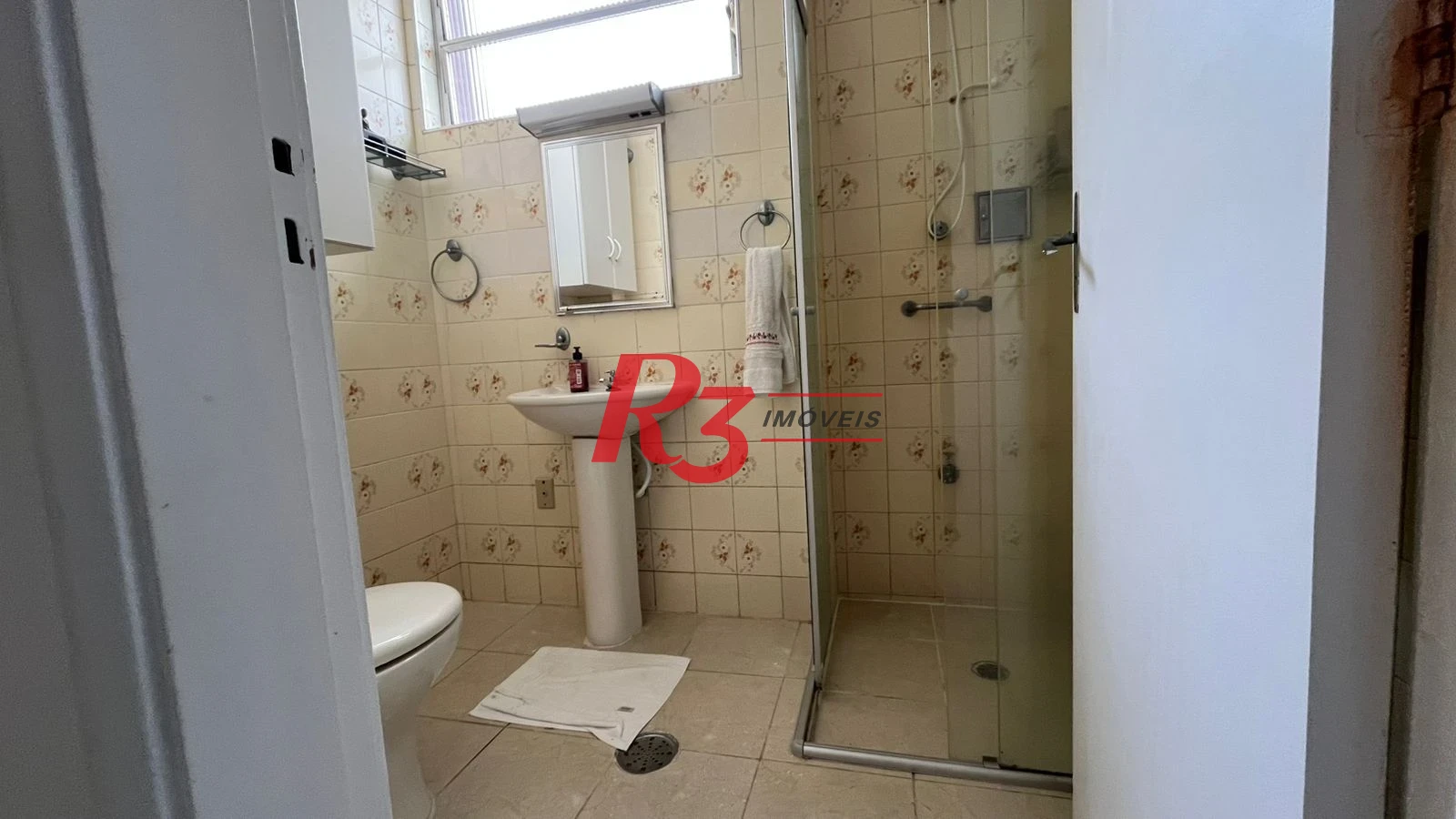 Apartamento com 2 dormitórios à venda, 75 m² por R$ 550.000,00 - Gonzaga - Santos/SP