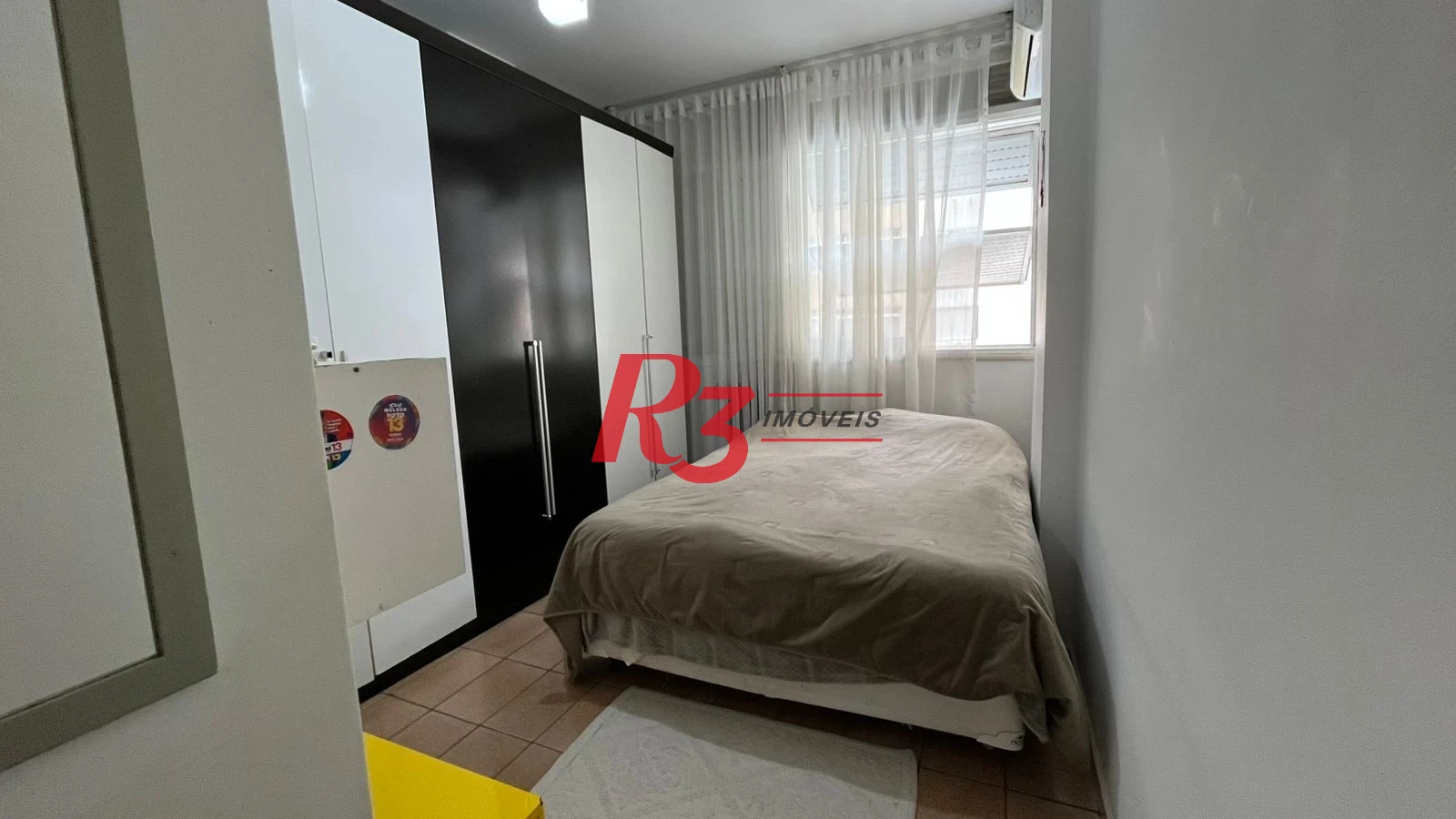 Apartamento com 2 dormitórios à venda, 75 m² por R$ 550.000,00 - Gonzaga - Santos/SP