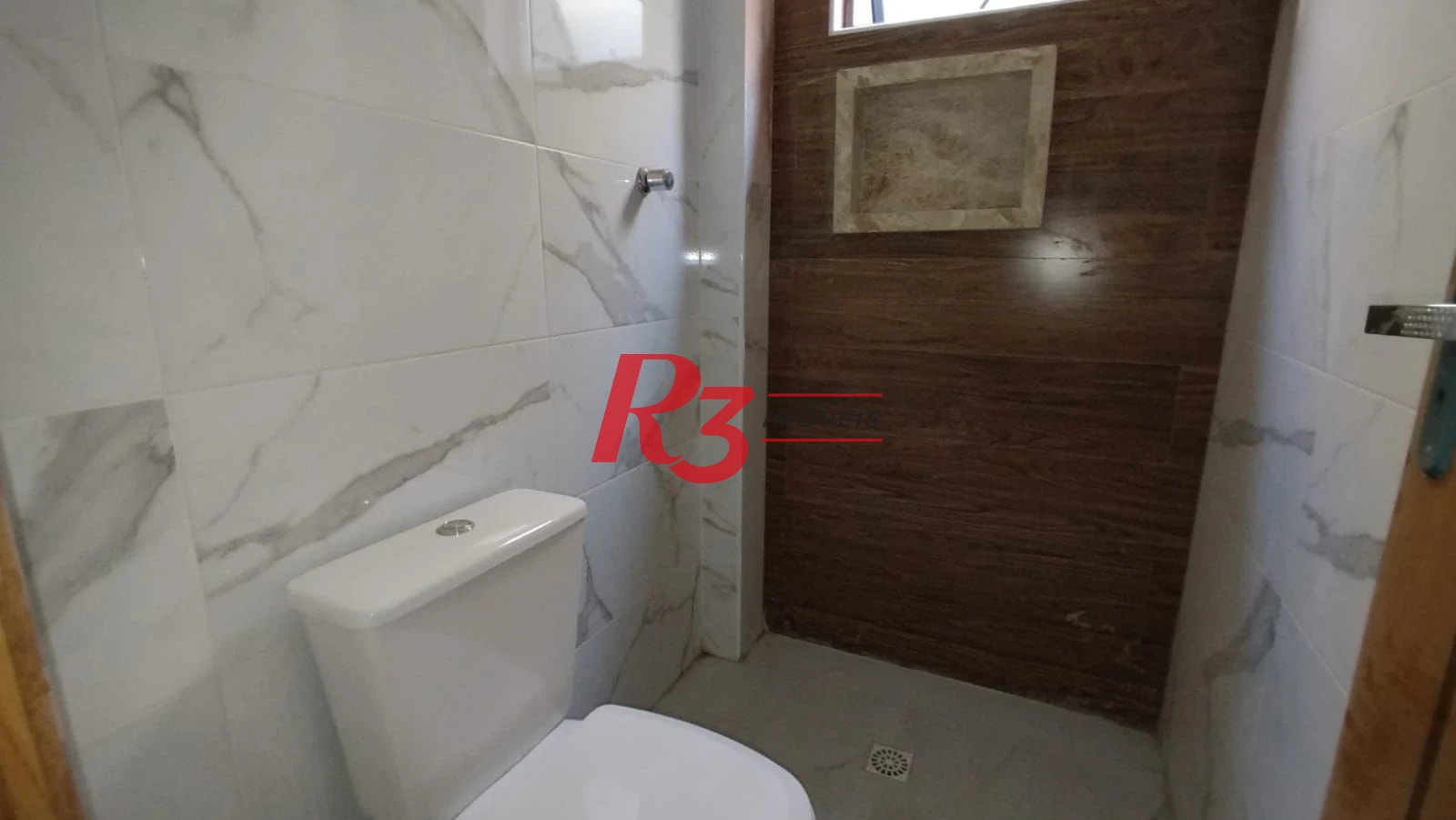 Casa com 3 dormitórios à venda, 100 m² por R$ 1.022.000,00 - Embaré - Santos/SP