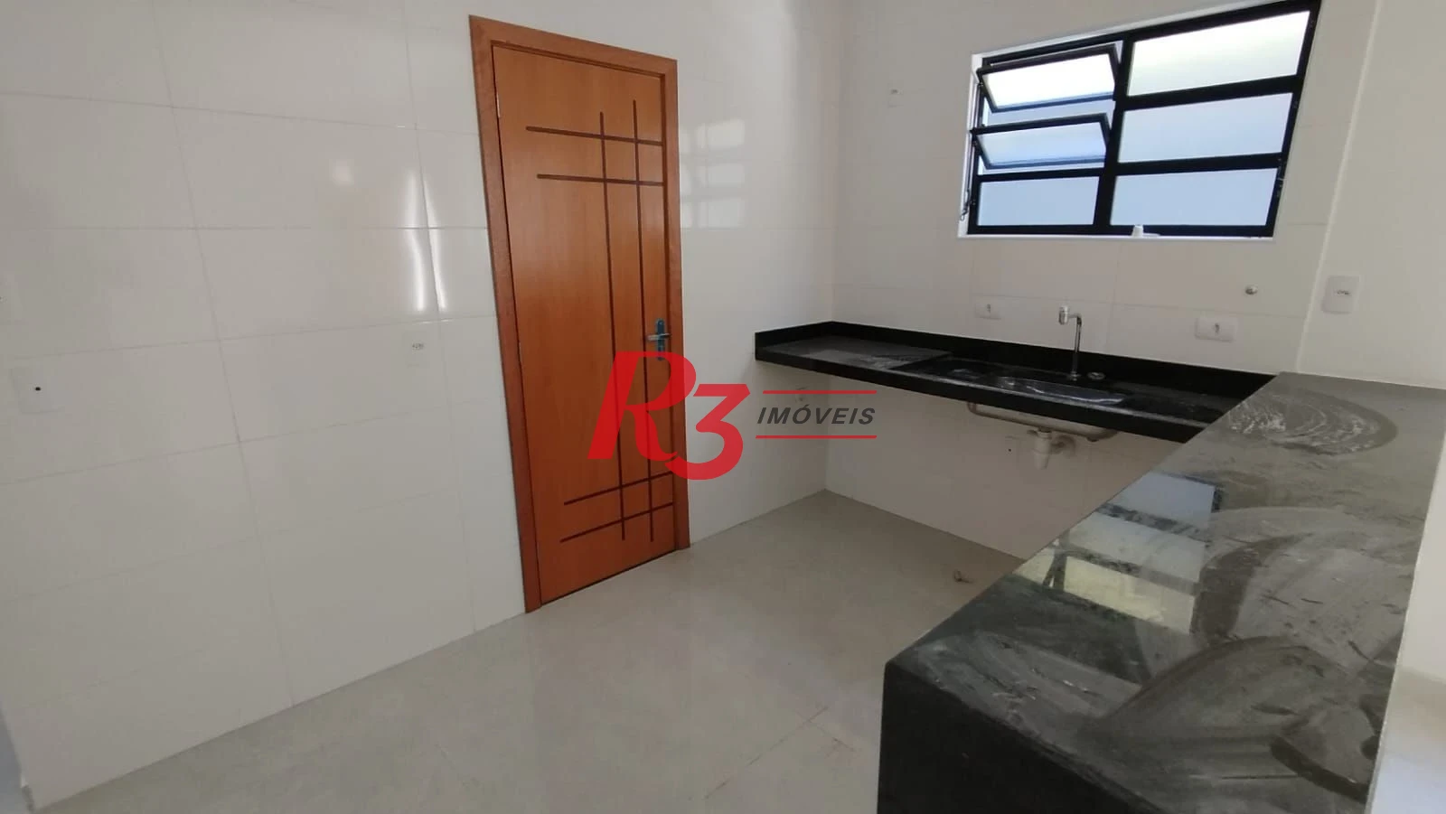 Casa com 3 dormitórios à venda, 100 m² por R$ 1.022.000,00 - Embaré - Santos/SP