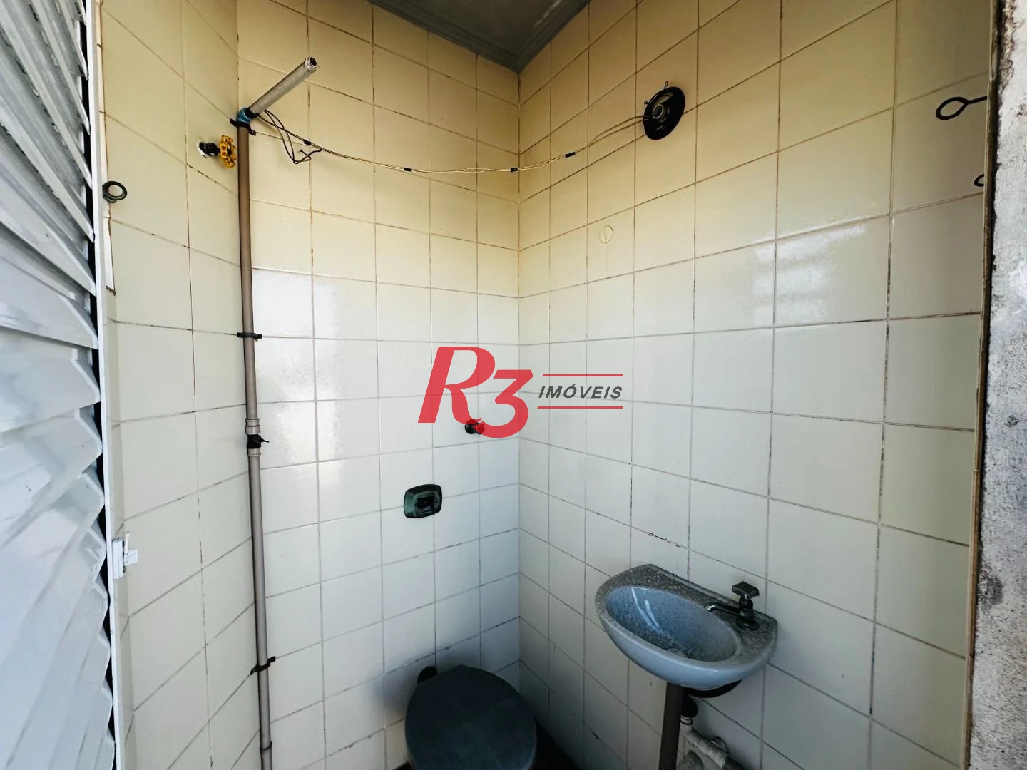 Prédio para alugar, 600 m² - Paquetá - Santos/SP