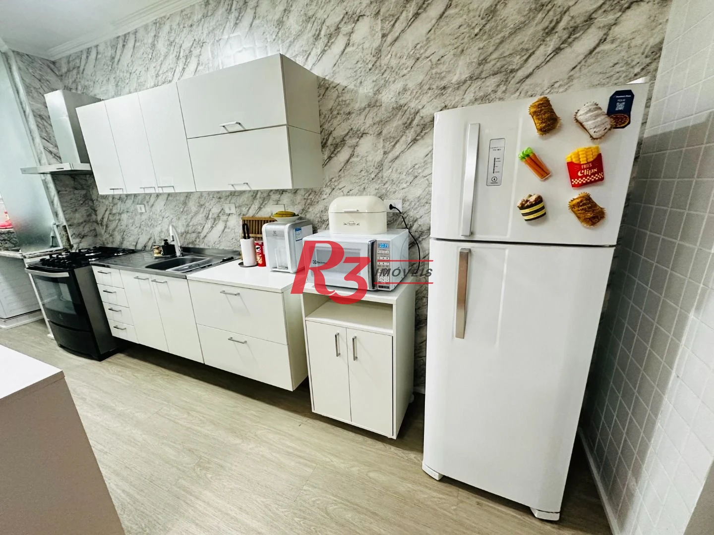 Apartamento com 2 dormitórios à venda, 67 m² por R$ 440.000,00 - Encruzilhada - Santos/SP