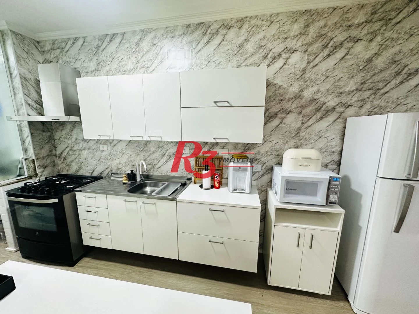 Apartamento com 2 dormitórios à venda, 67 m² por R$ 440.000,00 - Encruzilhada - Santos/SP