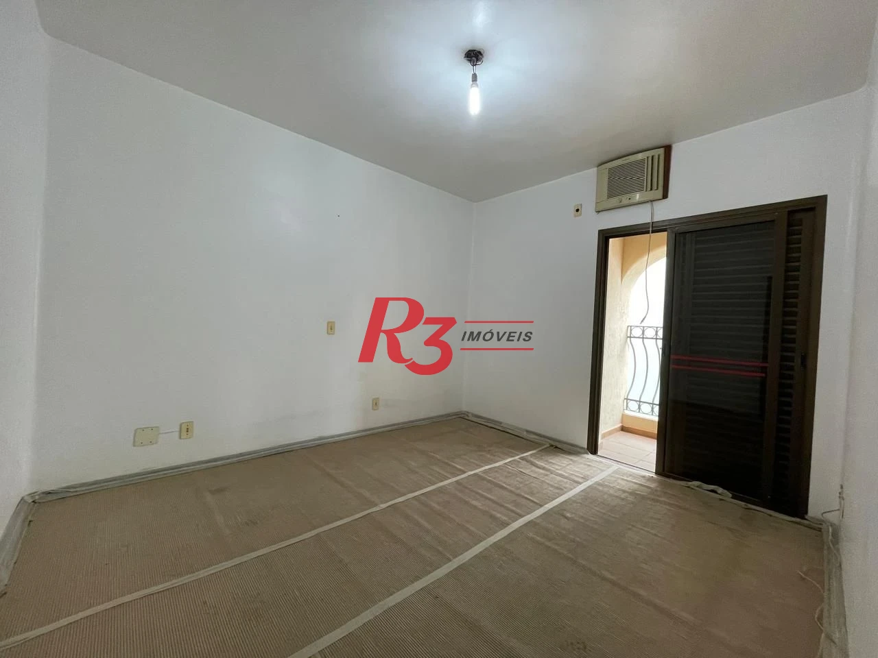 Apartamento com 3 dormitórios à venda, 117 m² por R$ 750.000,00 - Jardim das Conchas - Guarujá/SP