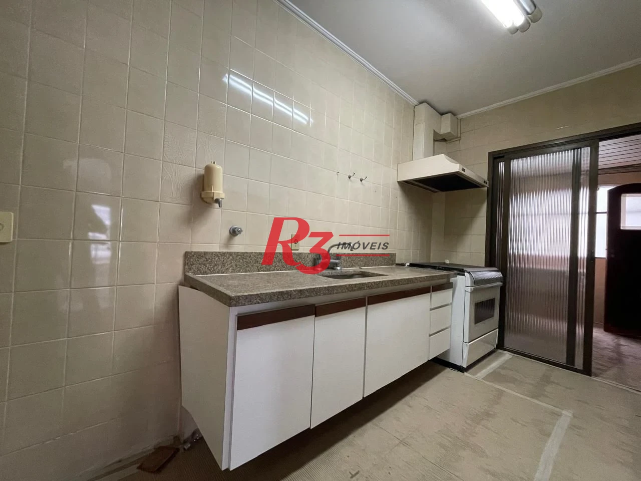Apartamento com 3 dormitórios à venda, 117 m² por R$ 750.000,00 - Jardim das Conchas - Guarujá/SP