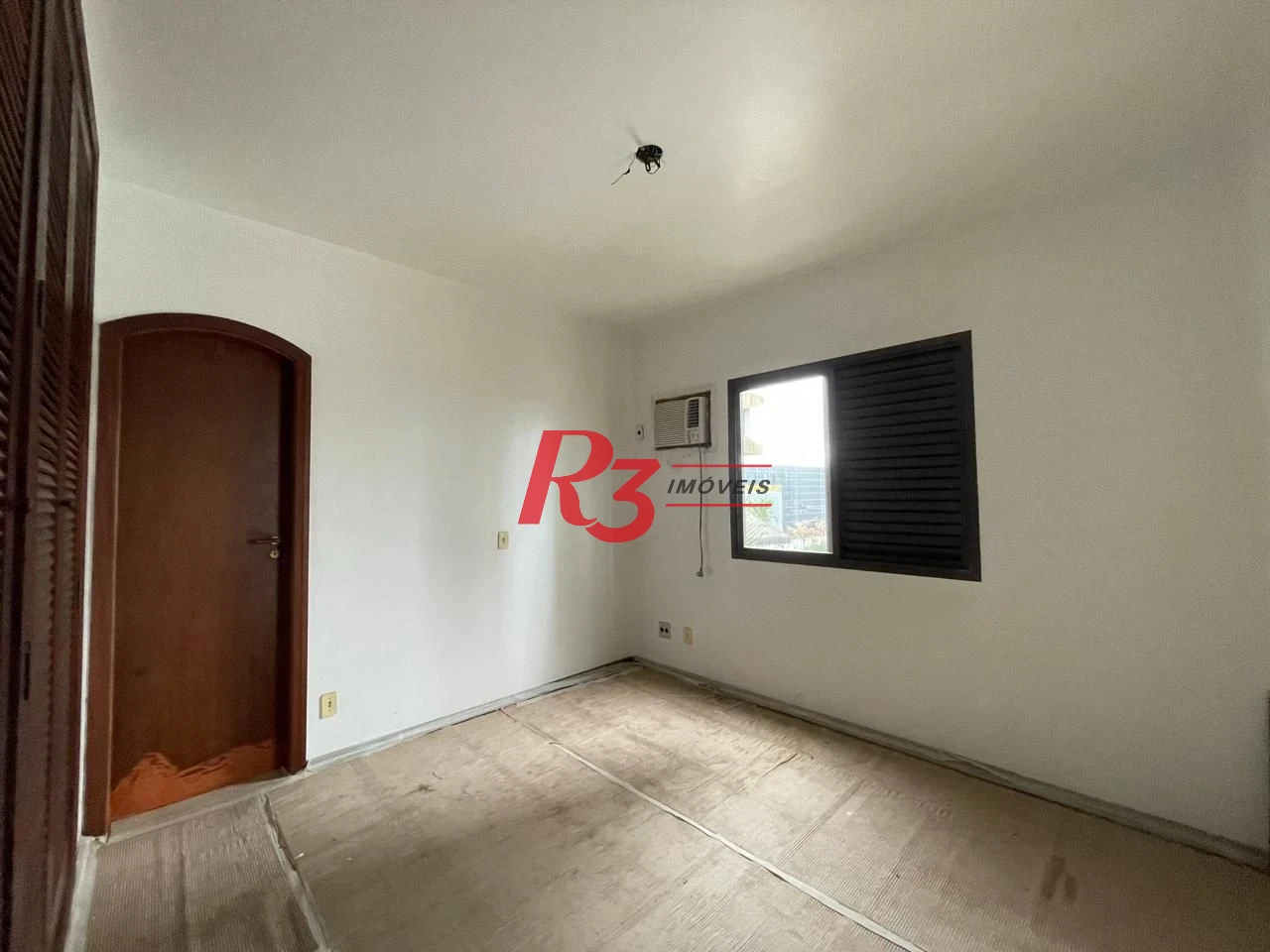 Apartamento com 3 dormitórios à venda, 117 m² por R$ 750.000,00 - Jardim das Conchas - Guarujá/SP