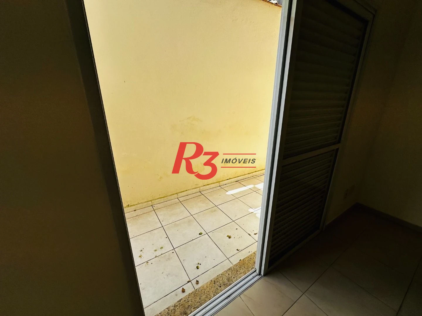 Casa com 3 dormitórios à venda, 120 m² por R$ 1.100.000,00 - Ponta da Praia - Santos/SP