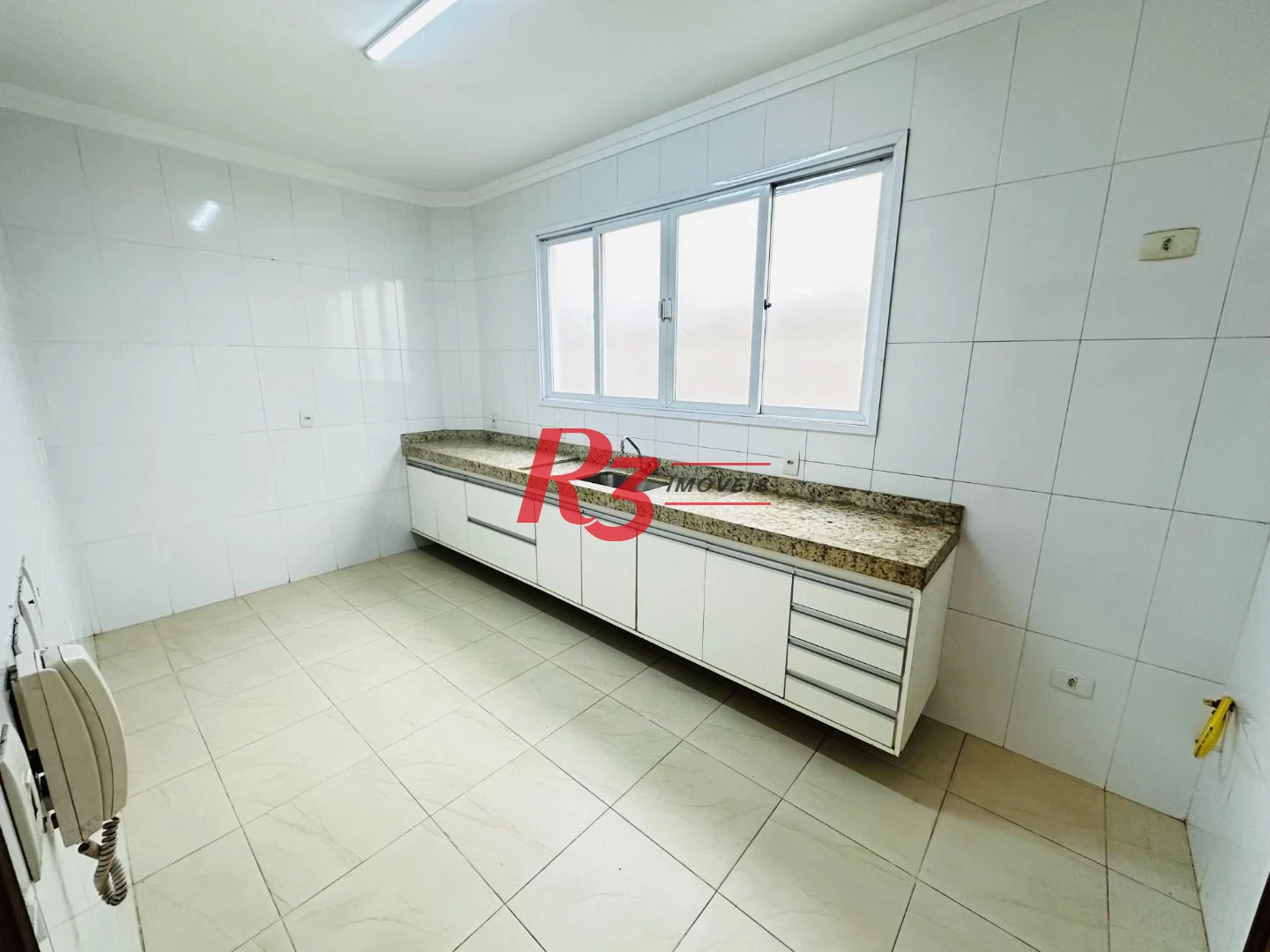 Casa com 3 dormitórios à venda, 120 m² por R$ 1.100.000,00 - Ponta da Praia - Santos/SP