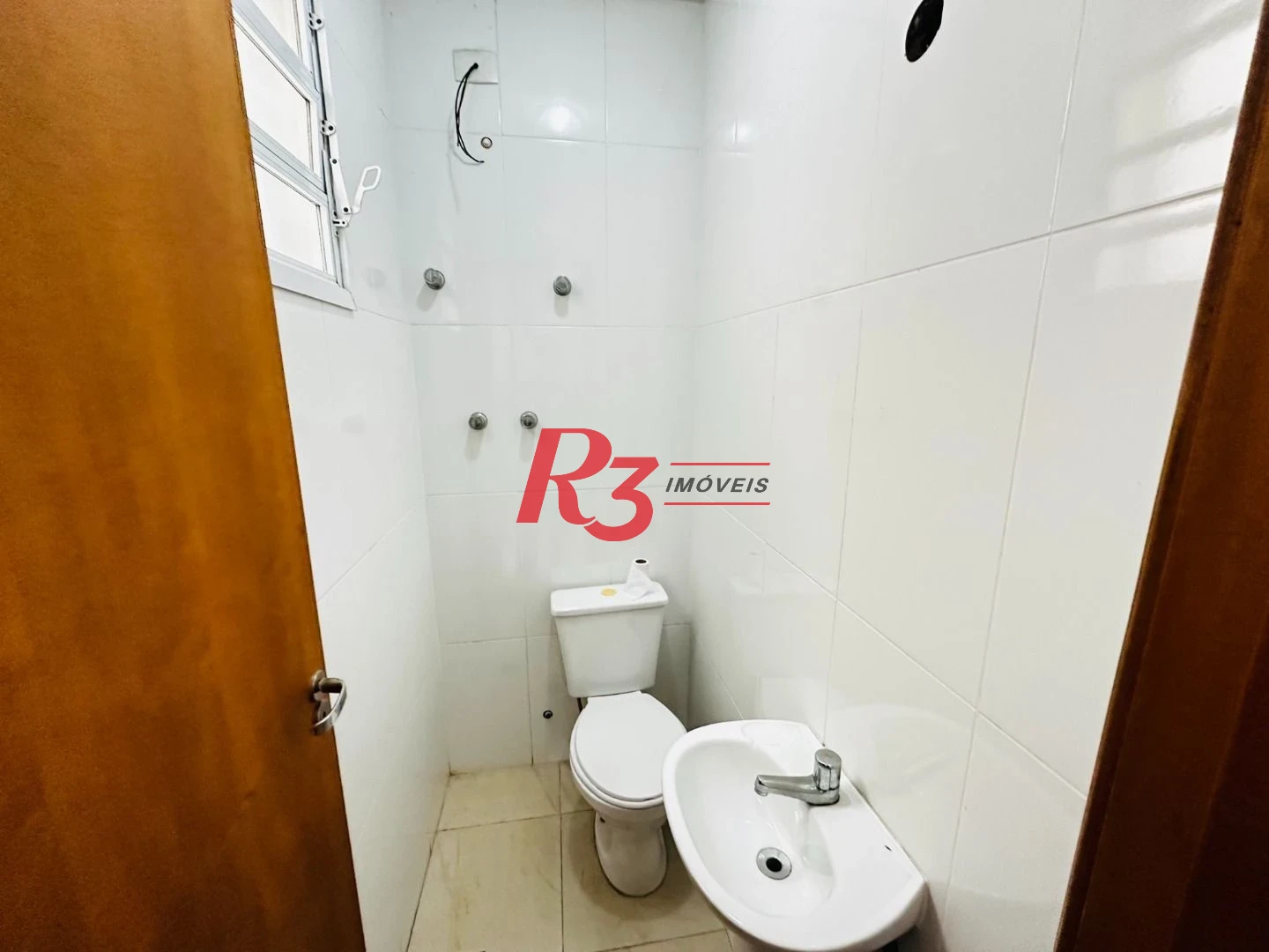 Casa com 3 dormitórios à venda, 120 m² por R$ 1.100.000,00 - Ponta da Praia - Santos/SP