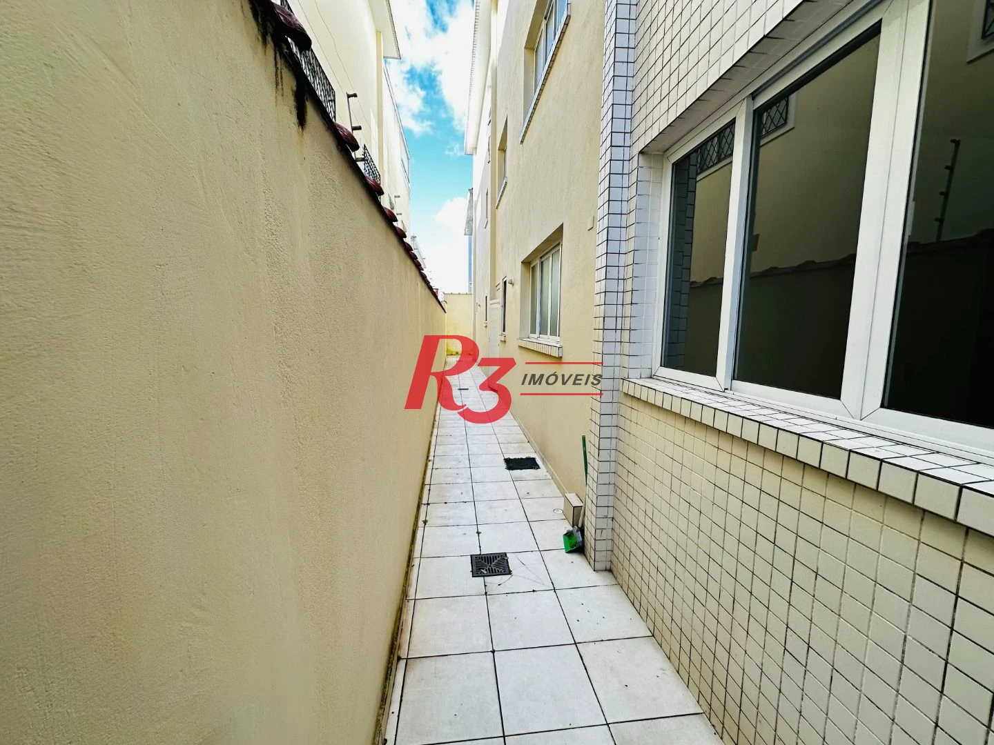 Casa com 3 dormitórios à venda, 120 m² por R$ 1.100.000,00 - Ponta da Praia - Santos/SP