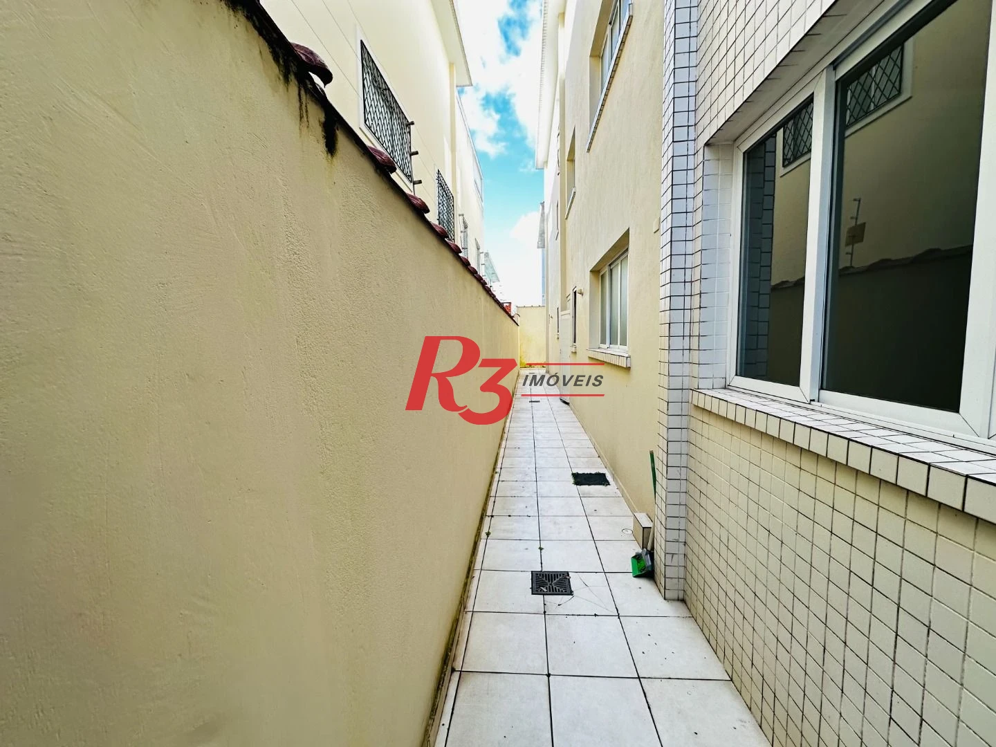 Casa com 3 dormitórios à venda, 120 m² por R$ 1.100.000,00 - Ponta da Praia - Santos/SP