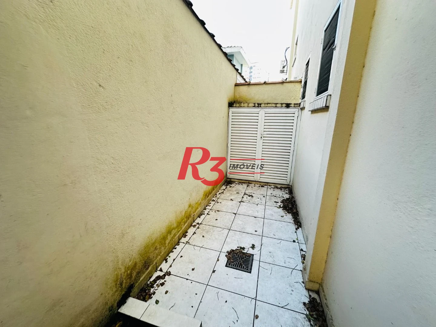 Casa com 3 dormitórios à venda, 120 m² por R$ 1.100.000,00 - Ponta da Praia - Santos/SP