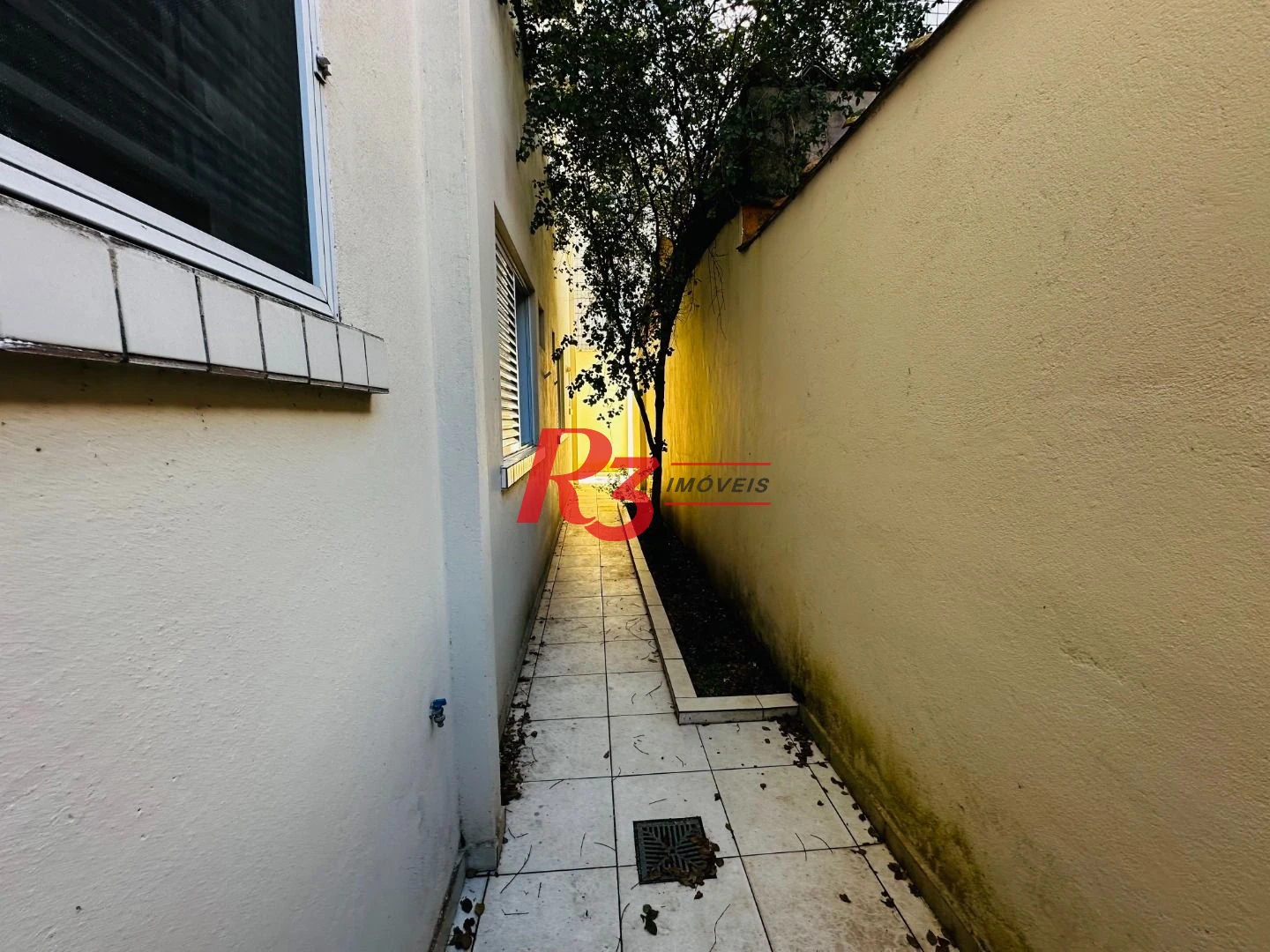 Casa com 3 dormitórios à venda, 120 m² por R$ 1.100.000,00 - Ponta da Praia - Santos/SP