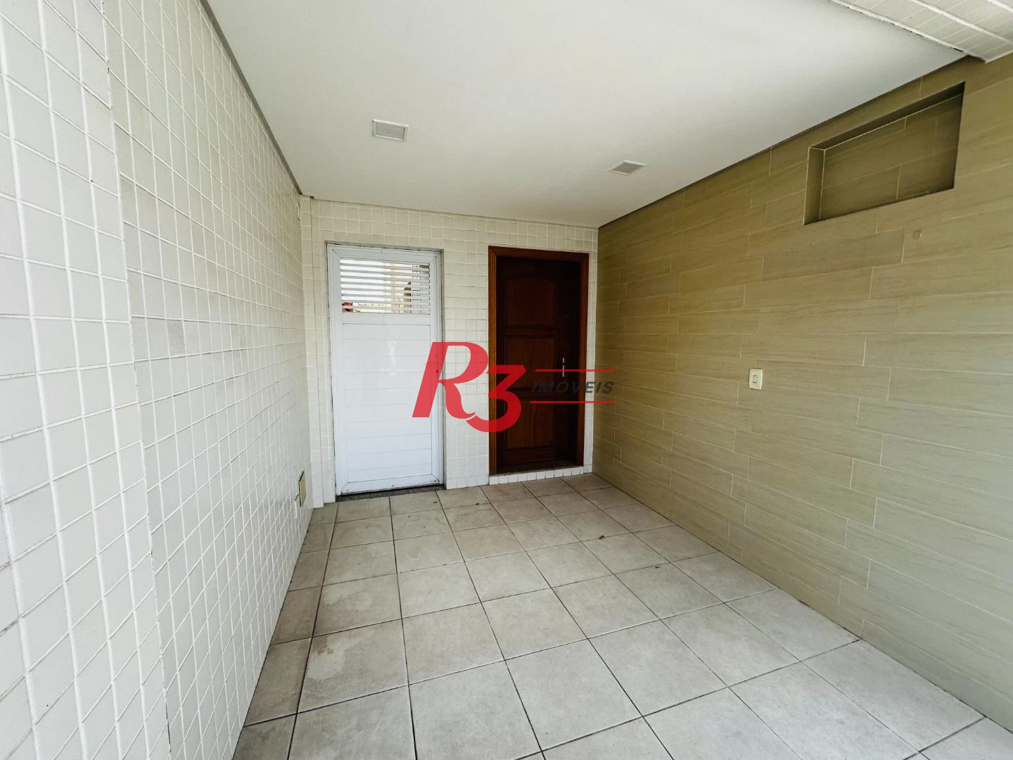 Casa com 3 dormitórios à venda, 120 m² por R$ 1.100.000,00 - Ponta da Praia - Santos/SP