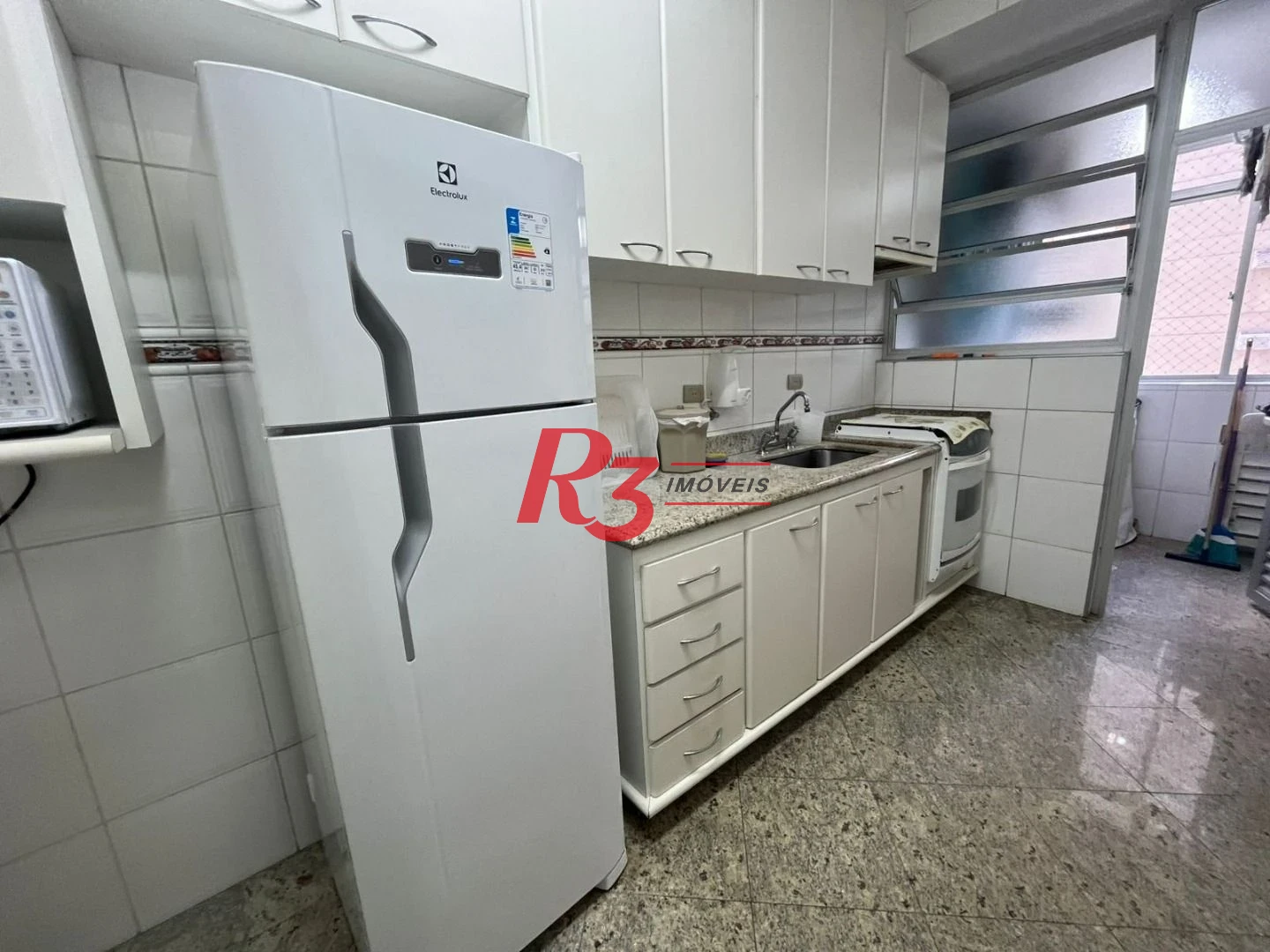 Apartamento com 3 dormitórios à venda, 115 m² por R$ 595.000,00 - Pitangueiras - Guarujá/SP