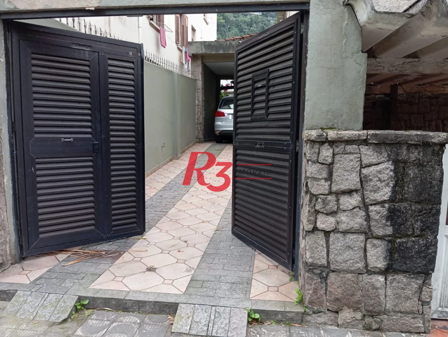 Sobrado com 3 dormitórios à venda, 185 m² por R$ 1.500.000,00 - José Menino - Santos/SP