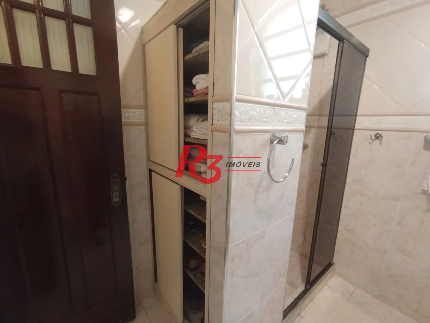 Sobrado com 3 dormitórios à venda, 185 m² por R$ 1.500.000,00 - José Menino - Santos/SP